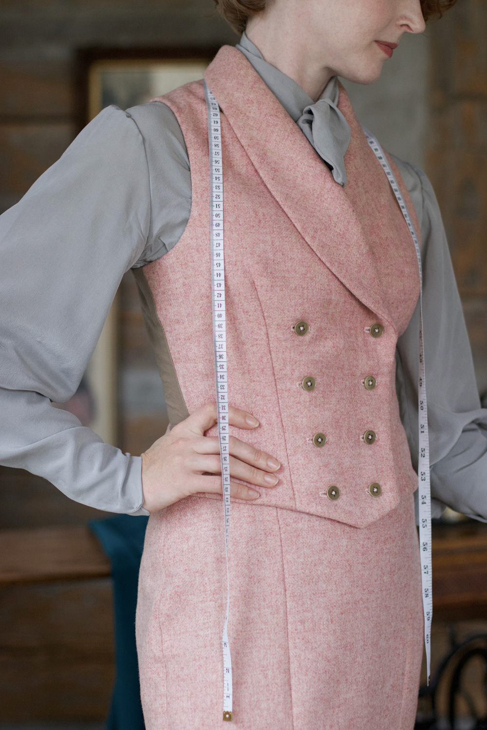Double breasted tailored waistcoat in 100% wool with fawn buttons