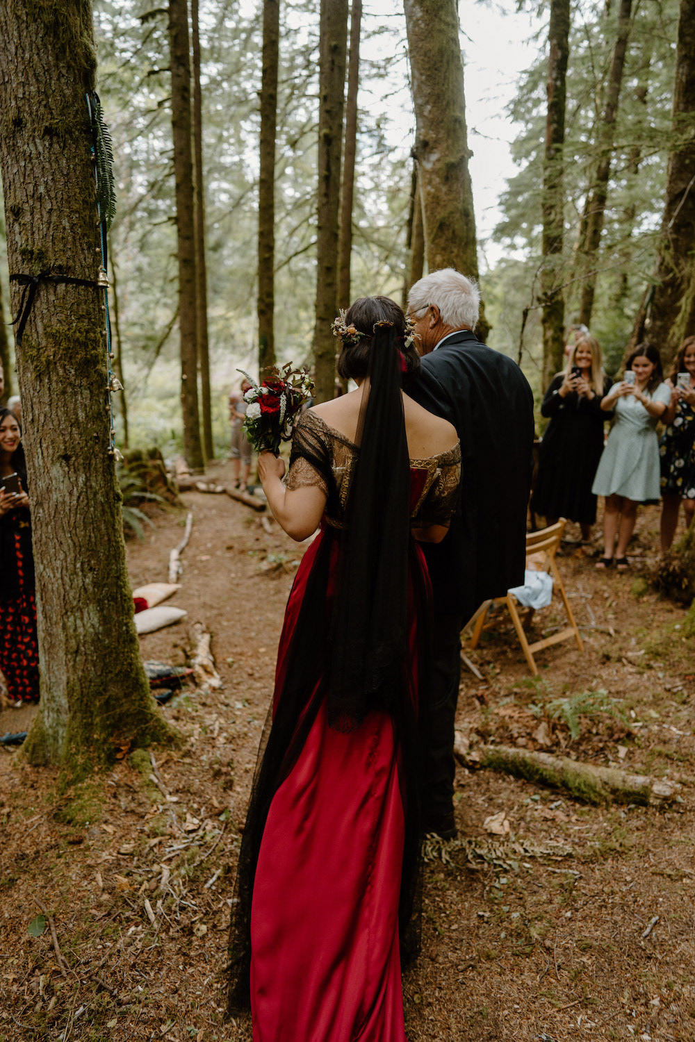 A 1911-inspired gown for an elegant Seattle bride. The gown is sewn in duchesse silk satin with antique repurposed trims and laces. The interior is finished by hand with boning for silhouette support. While this exact design is not available for reproduction, variations of post-Edwardian evening gowns can be customized. Photo courtesy of Cat Ruchalski Photography.
