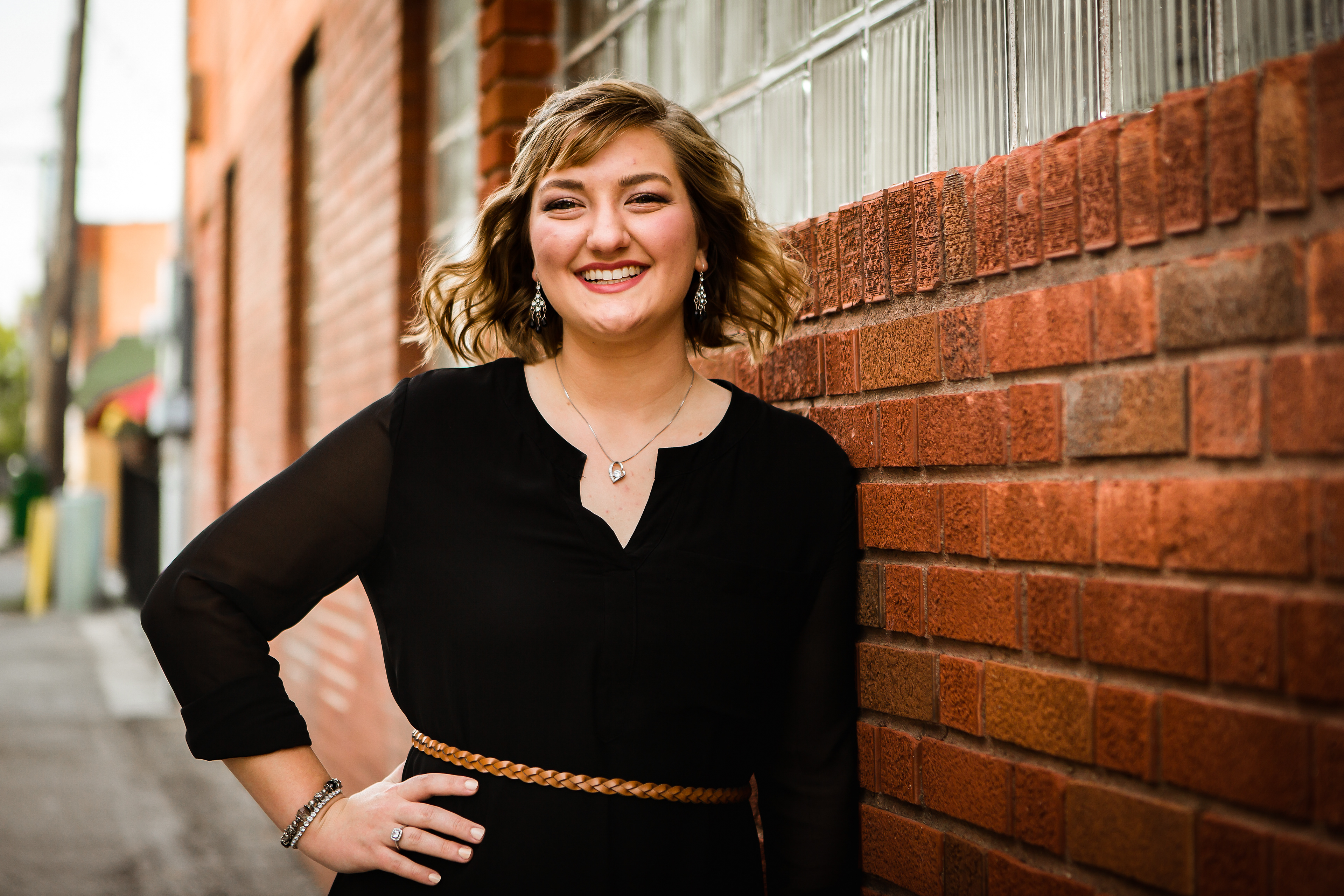 Senior photo of Alyssa at Downtown Lee's Summit, Missouri. Urban senior photo shoot.