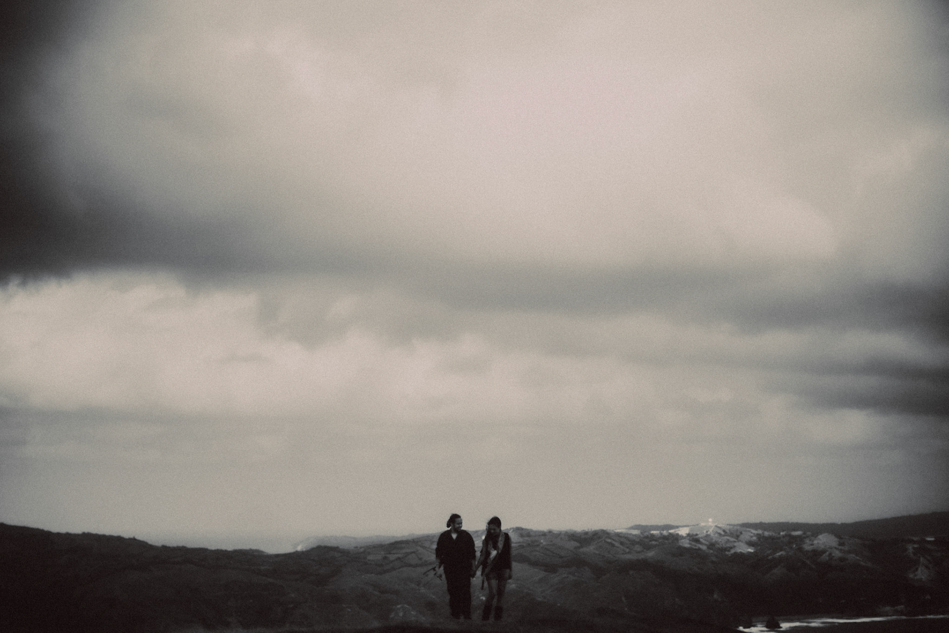 Adventure couple portraits at Chamantad-Tinayan Viewpoint overlooking the Luzon Strait in Sabtang, Batanes, Philippines, Southeast Asia, November 2014, Canon EOS 6D.