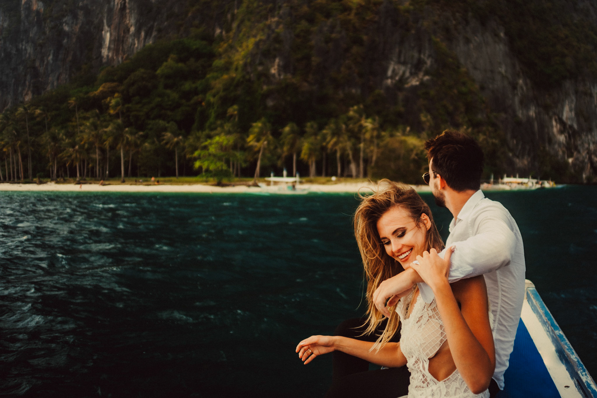 Approaching Pinagbuyutan Island on an outrigger boat, from Johnny and Sylvia's travel couple honeymoon shoot and island hopping tour in El Nido, Palawan, Philippines, Southeast Asia, December 2019, Sony A7III.