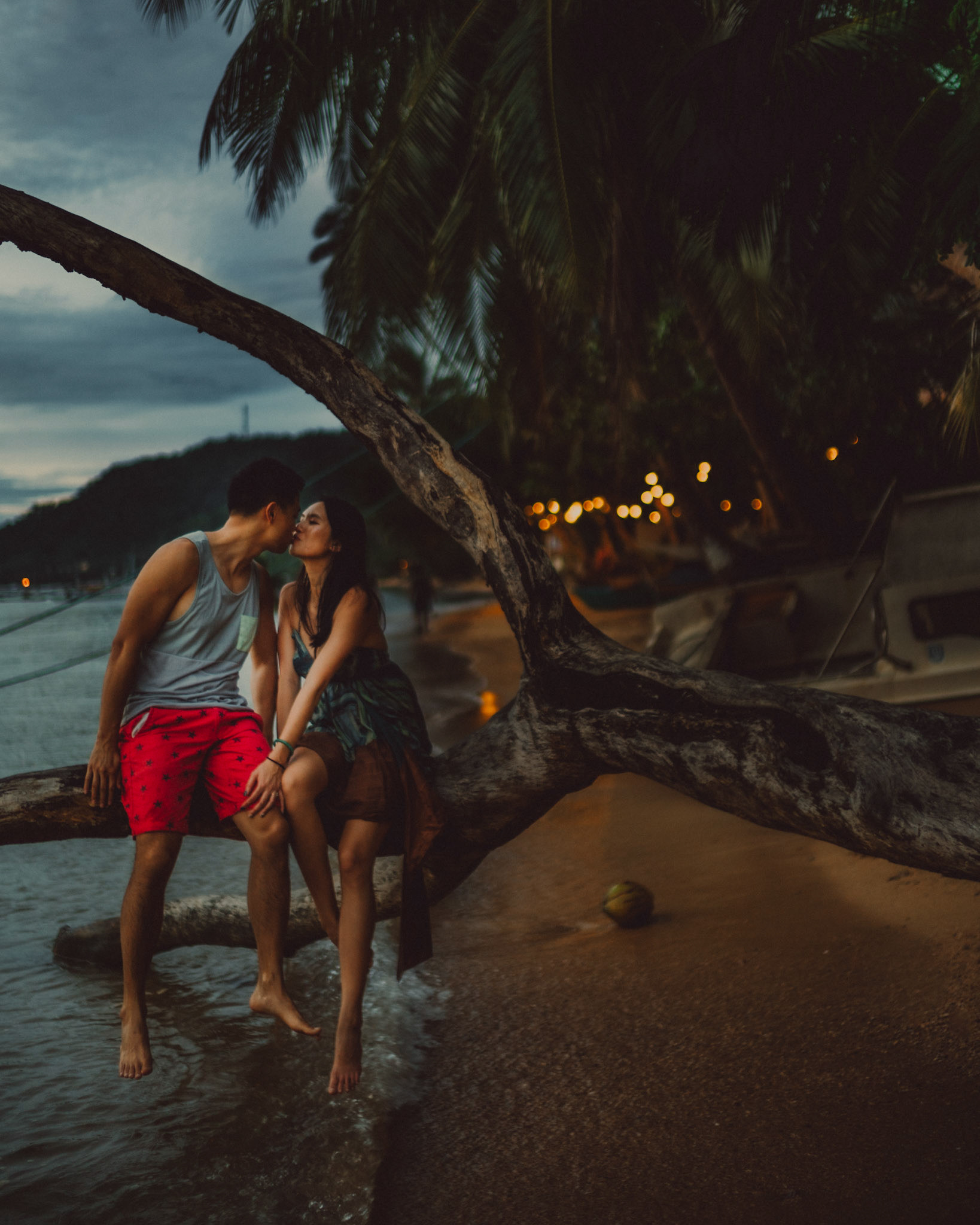 Sitting on a fallen tree, from George and Allie's honeymoon portrait shoot, Corong-Corong Beach, El Nido, Palawan, Philippines, Southeast Asia, December 2018, Sony A7III