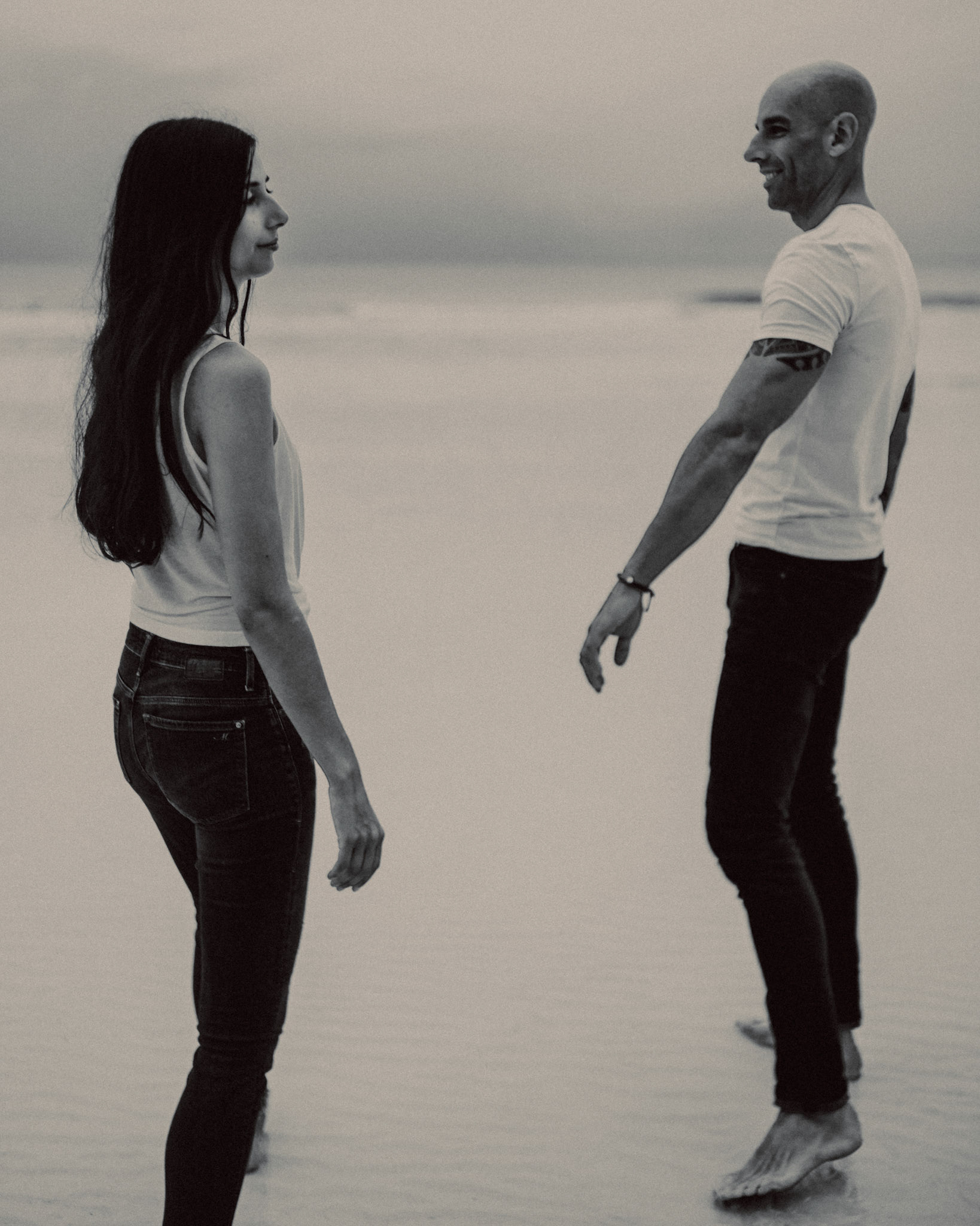 Couple portraits at White Beach Station 1, in black and white, shot in front of Discovery Shores, Boracay, Philippines, Southeast Asia, December 2018, Sony A7III.