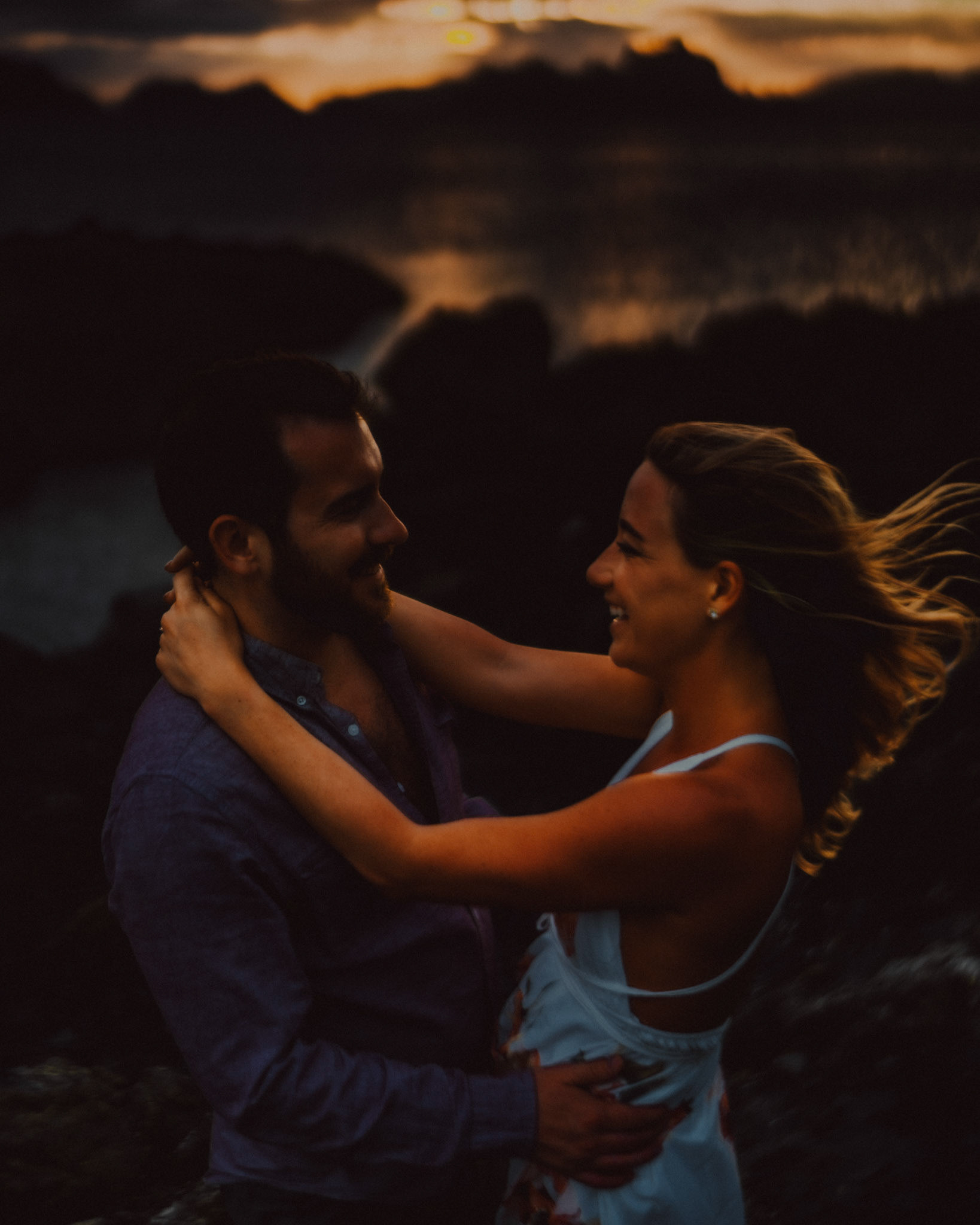 Chill golden hour couple portraits with moody tones in Las Cabanas Beach, El Nido Palawan, Philippines, Southeast Asia, March 2019, Sony A7III.