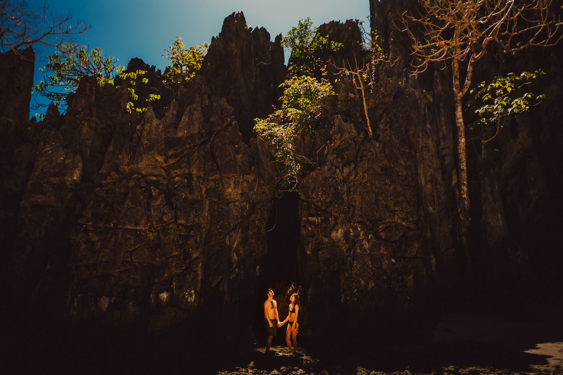 In front of a small cave on the south corner of Hidden Beach, Matinloc Island, El Nido, Palawan, Philippines, Southeast Asia, March 2020, Sony A7III.