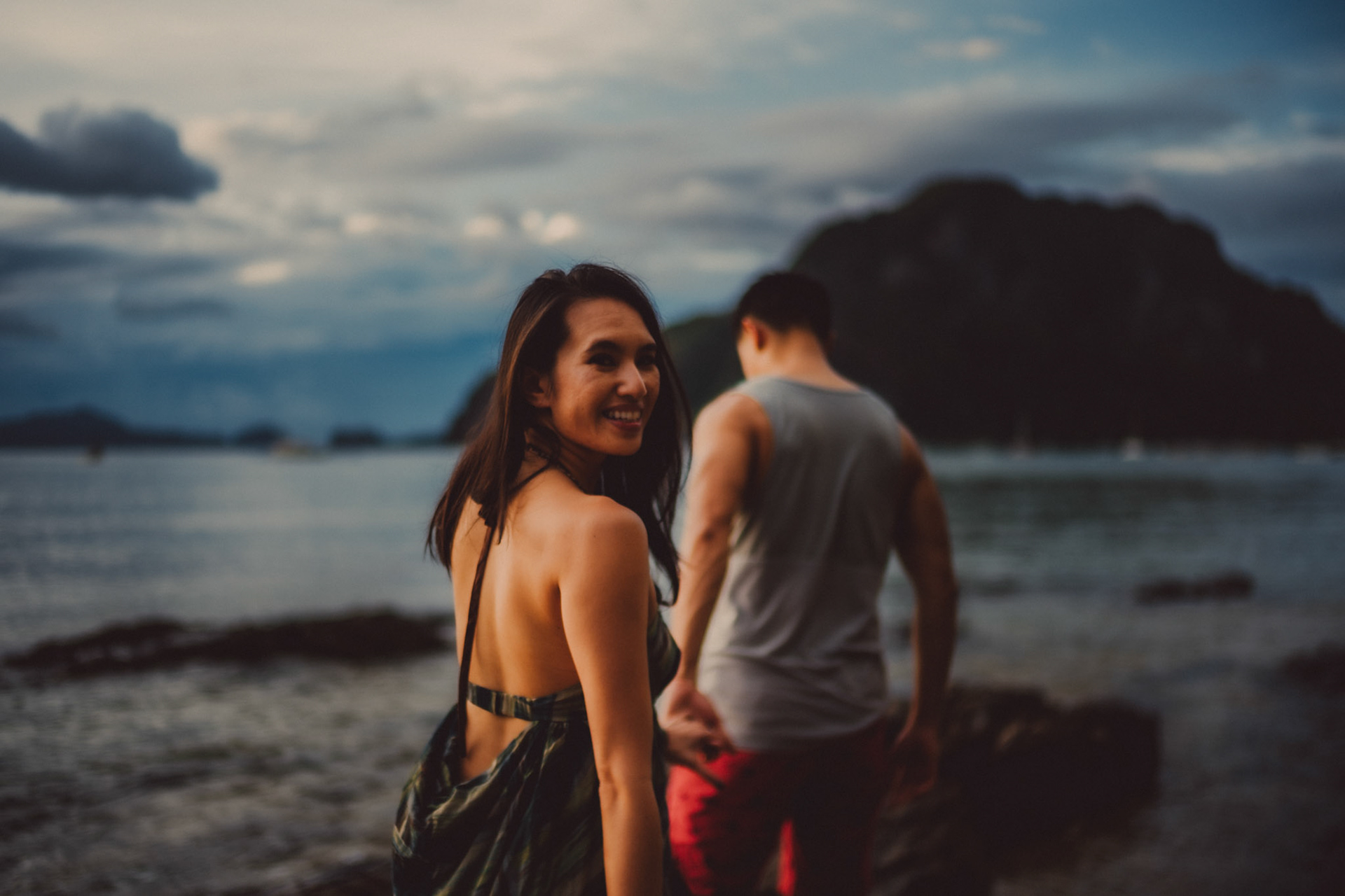 Blue hour couple portraits on a rocky coast, just below Republica Sunset Bar, from George and Allie's honeymoon portrait shoot, Corong-Corong Beach, El Nido, Palawan, Philippines, Southeast Asia, December 2018, Sony A7III