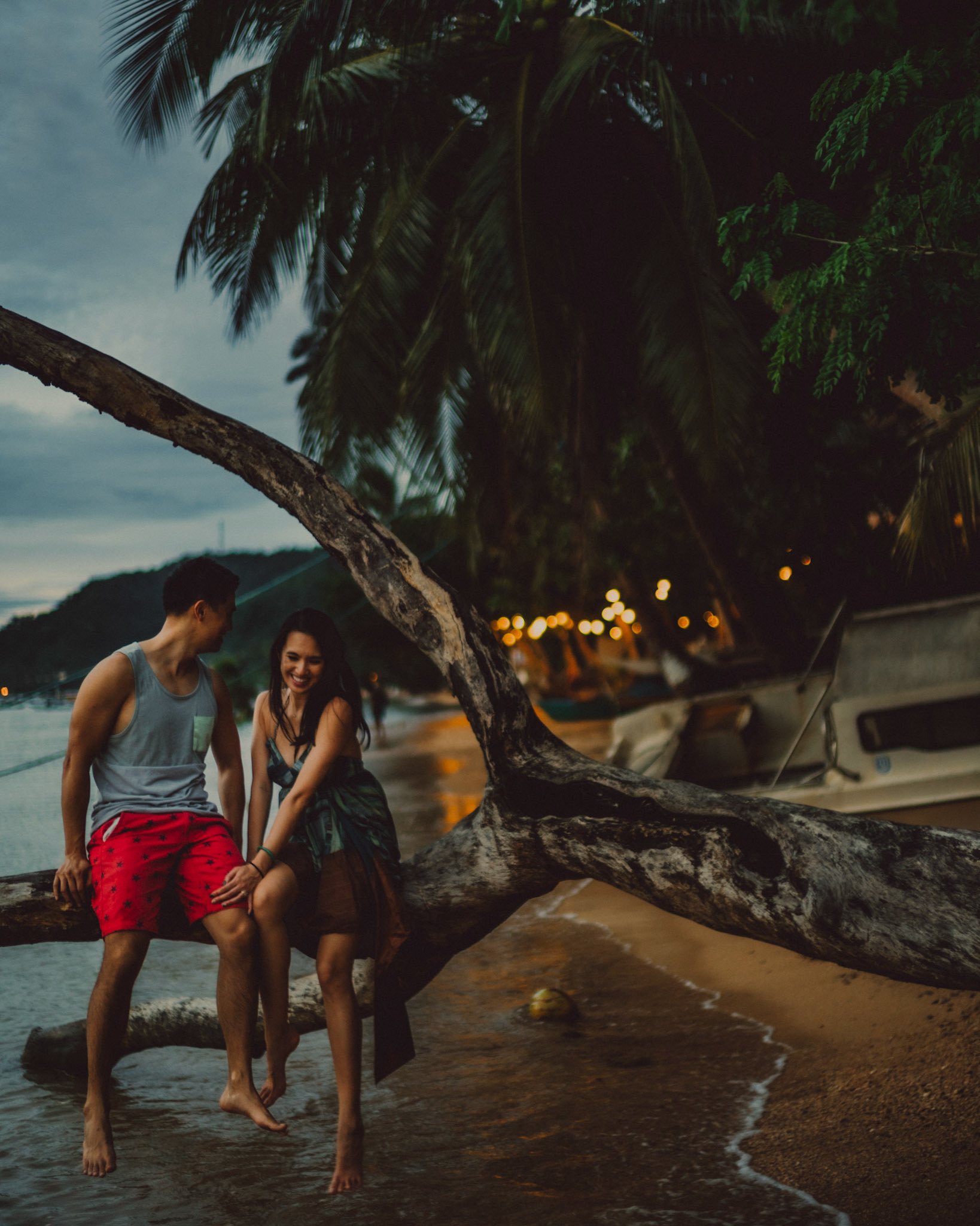 Sitting on a fallen tree, from George and Allie's honeymoon portrait shoot, Corong-Corong Beach, El Nido, Palawan, Philippines, Southeast Asia, December 2018, Sony A7III