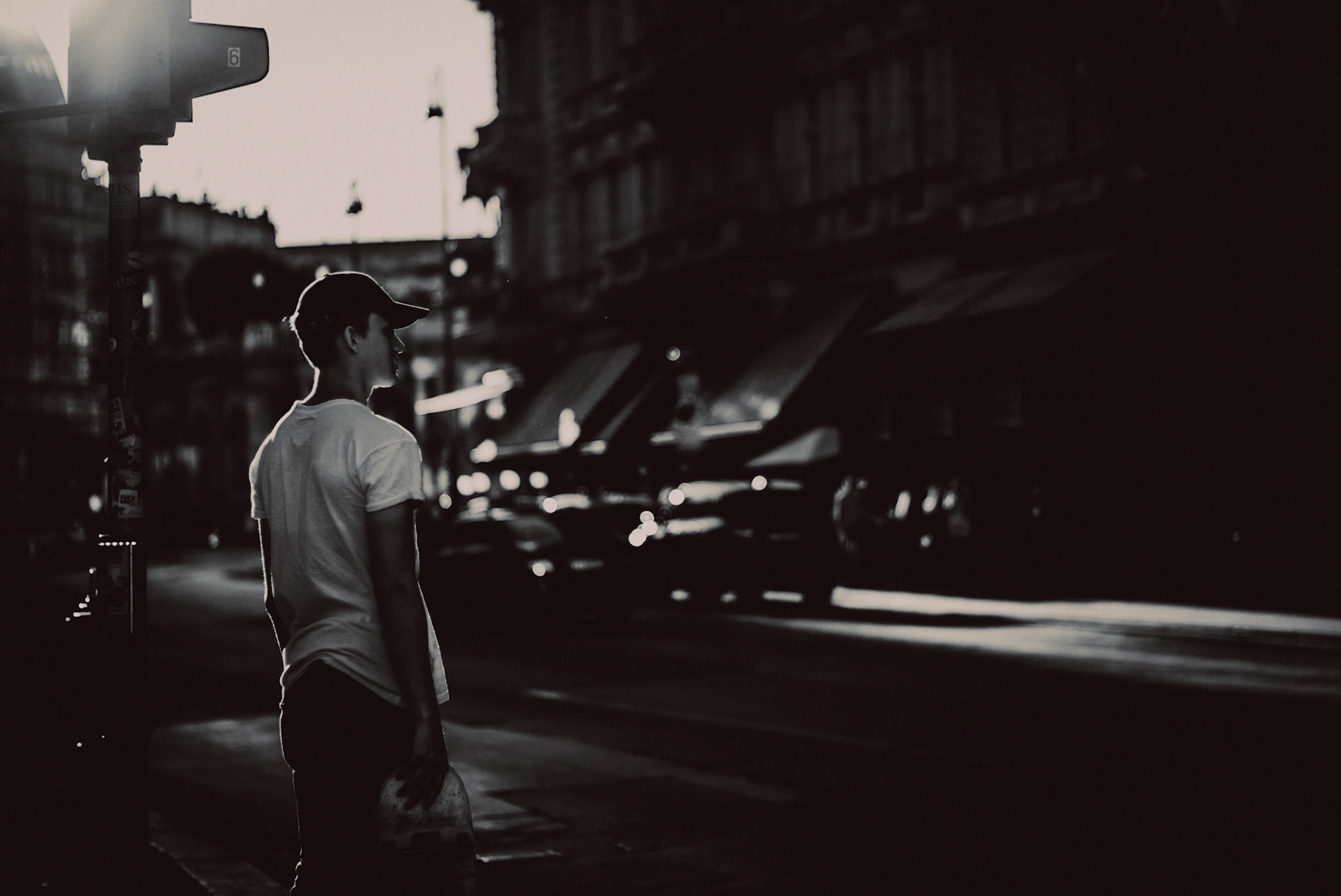 A skateboarder outside Hotel Sacher, in black and white, Vienna, Austria, July 2016, Leica M.