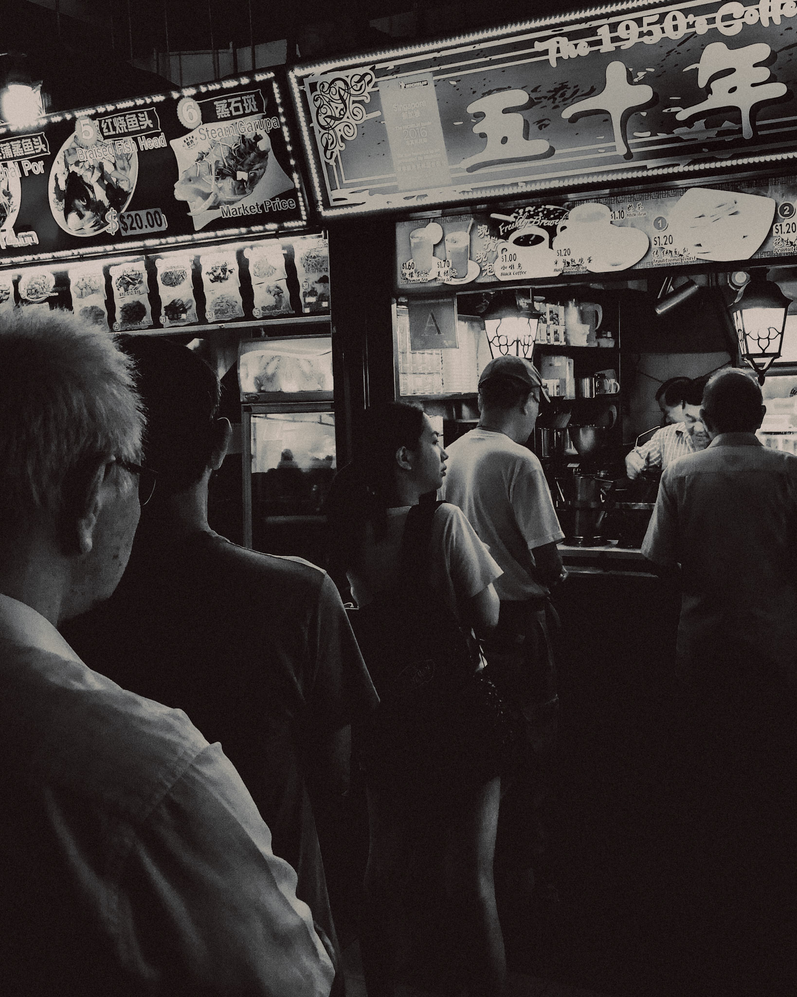 A teenage girl amidst elderly men in a Kopitiam queue, Chinatown, Singapore, October 2017, Huawei Mate 9 Pro.
