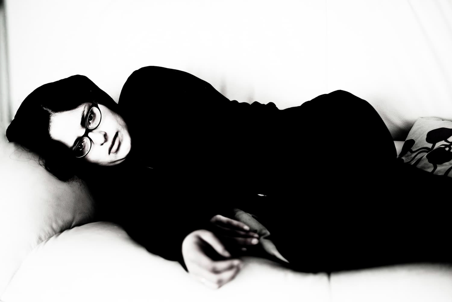 Woman laying on couch