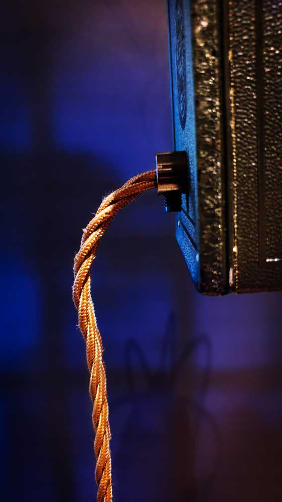 Antique style cord grip with vintage braided cable