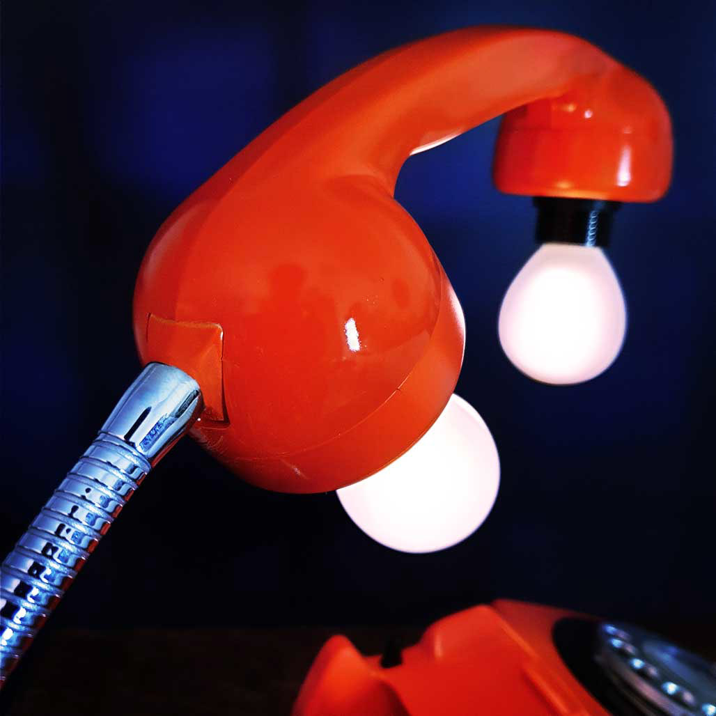 Flexible chrome arm to reposition the handset