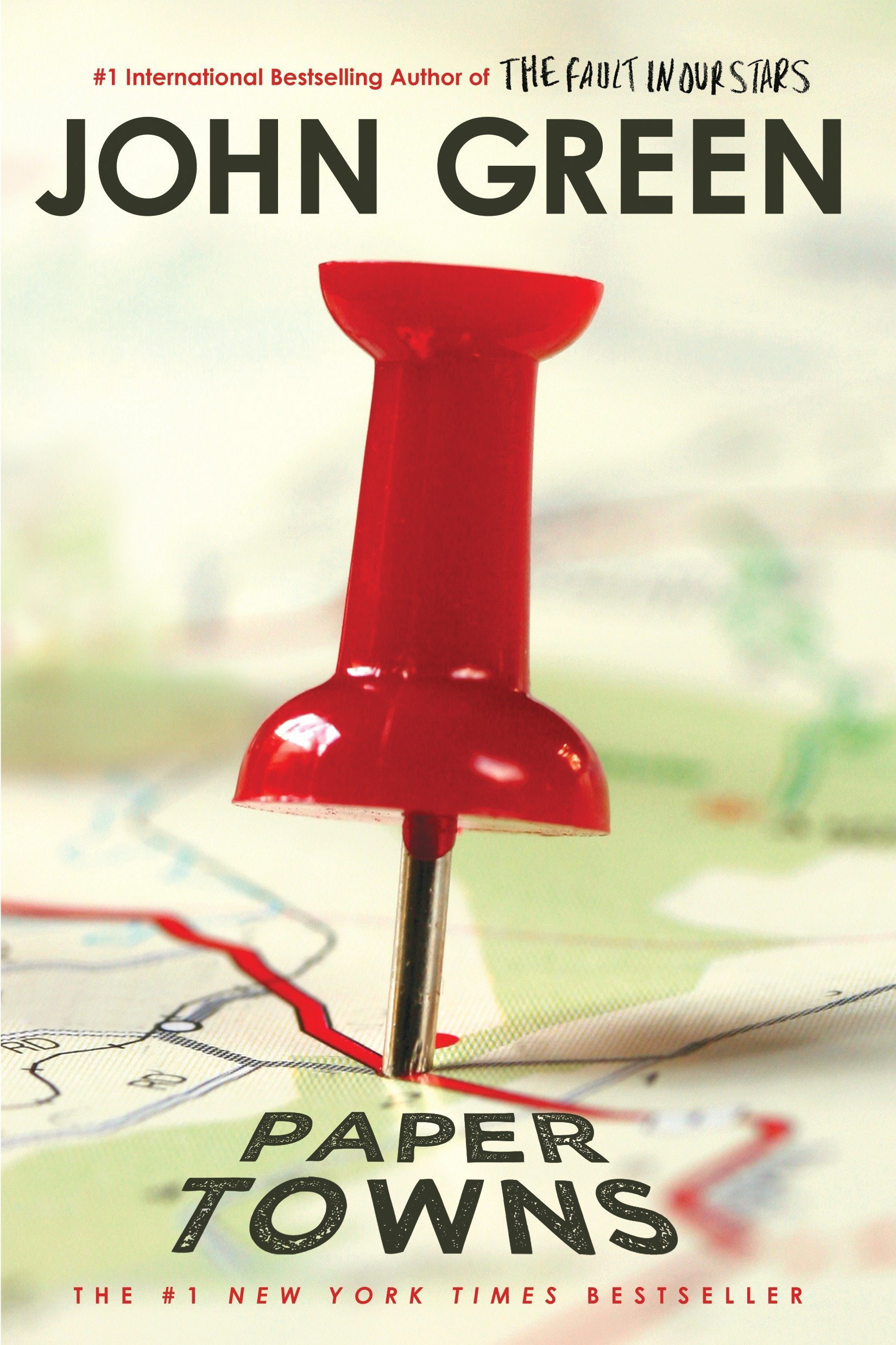 Book cover: A red push pin is sticking in a map.