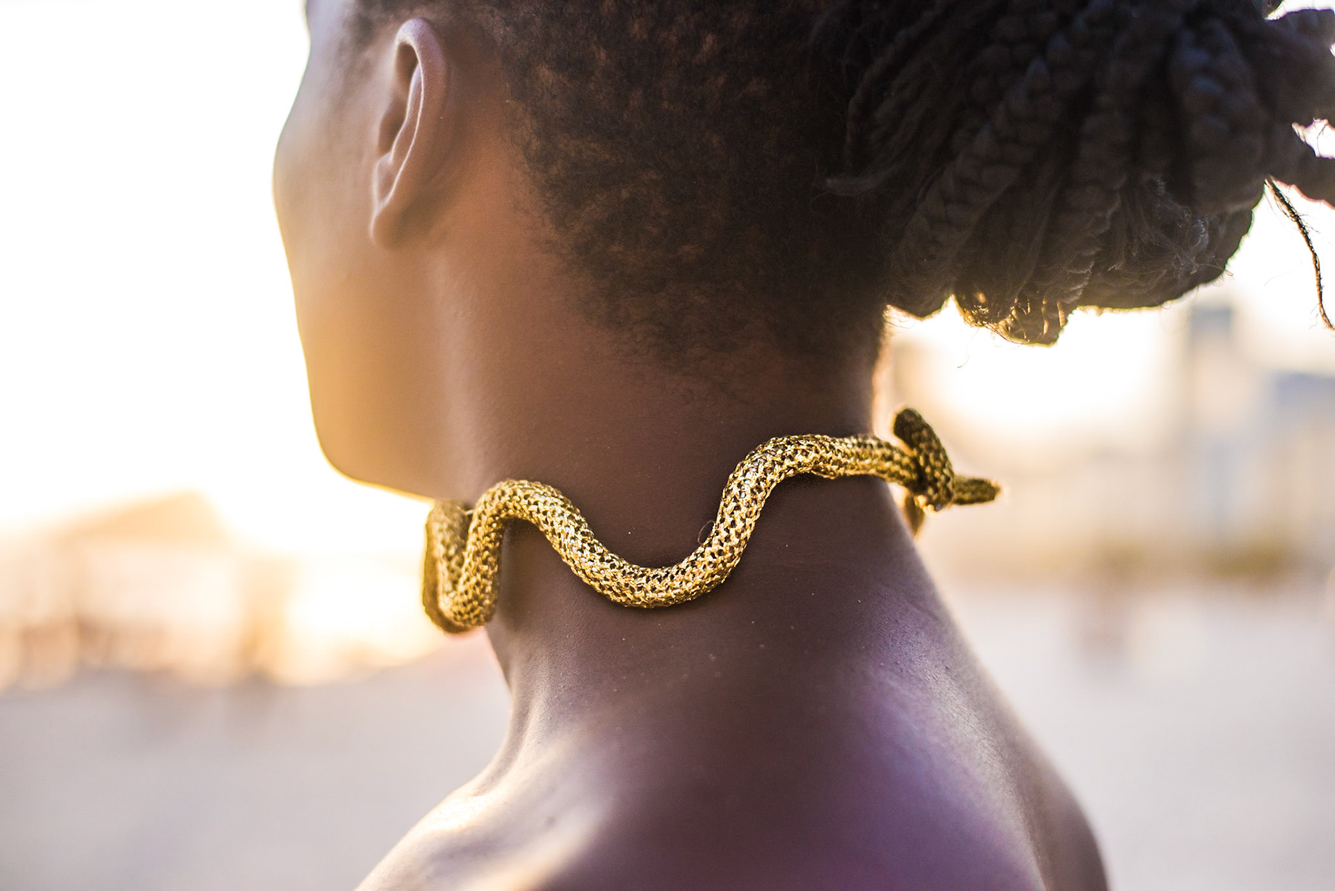 Model with golden necklace watches sunset. Modelo cordão dourado observa por do sol. fashion photography, designer, clothes, dress, accessory, product, still, brand, lookbook, shooting, vibrant, colorful, beach, creative, catalogue, outfit, look.fotografia de moda, design, roupa, vestido, acessório, produto, still, marca, vibrante, colorida, praia, catálogo. rio de janeiro