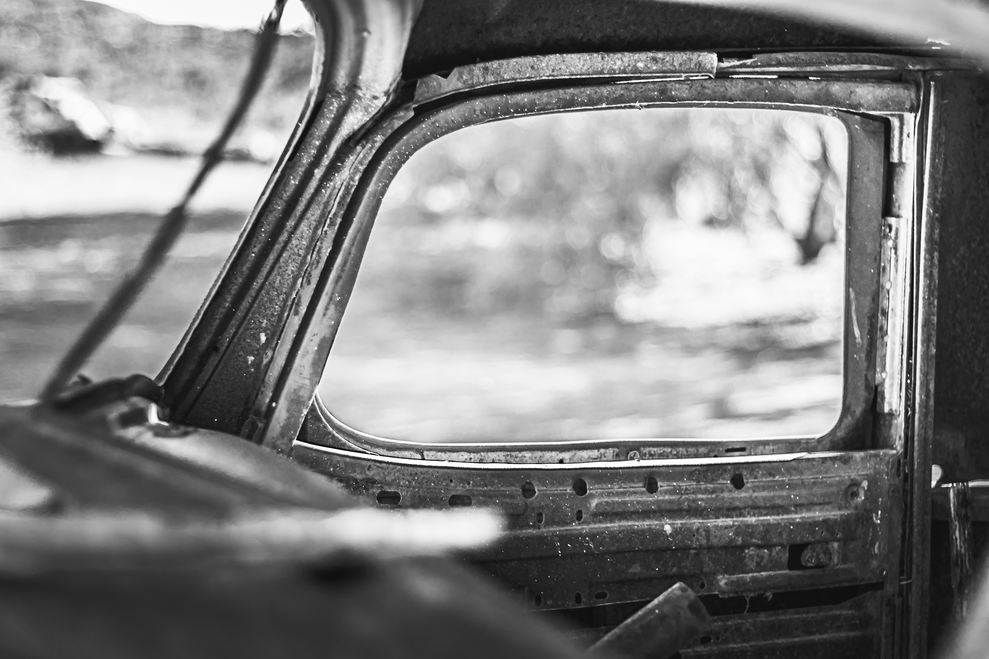 Photo of rusty old car window