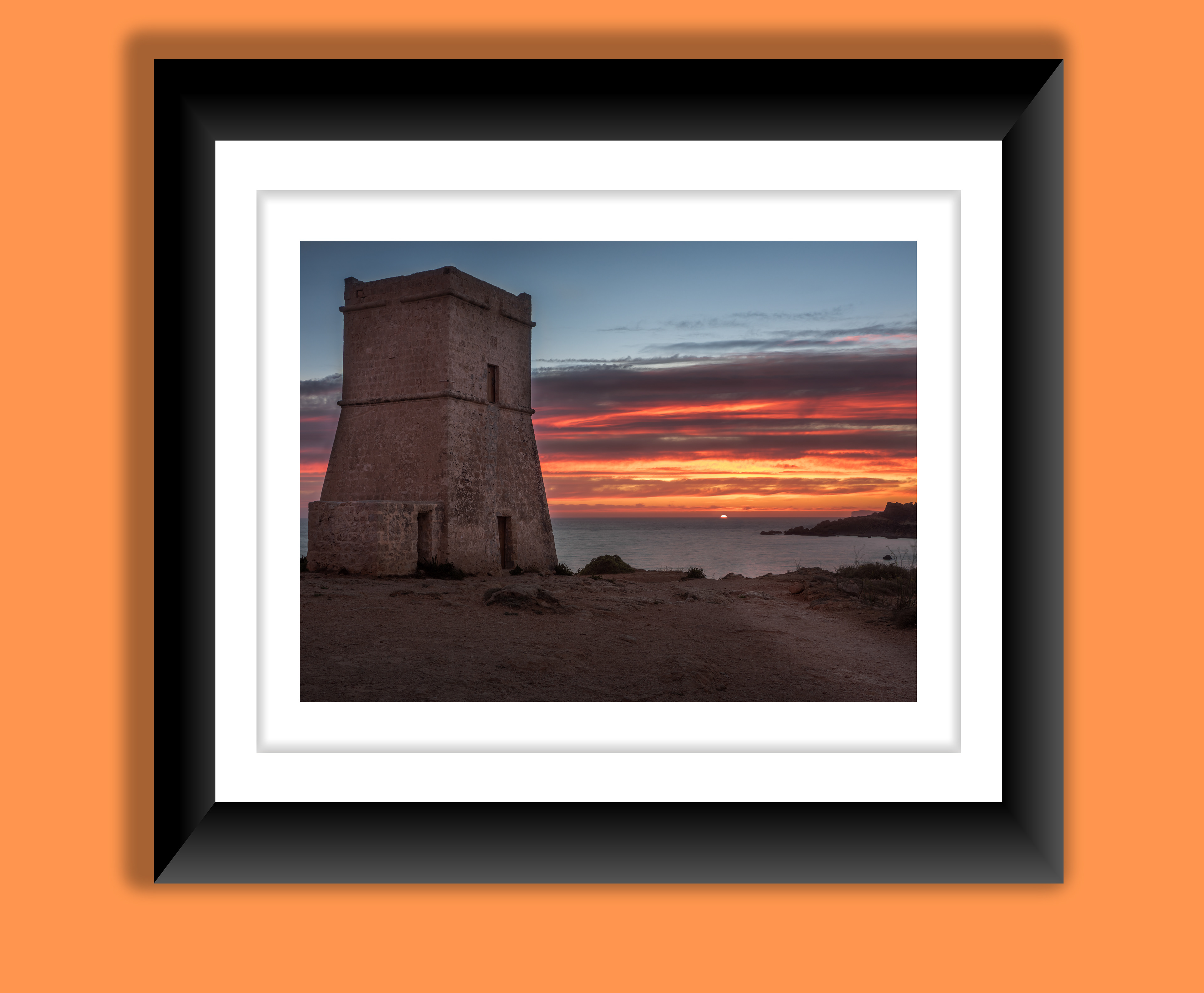 A beautiful fine art print of one of the many watch towers scattered around the Maltese islands during a beautiful vibrant sunset.