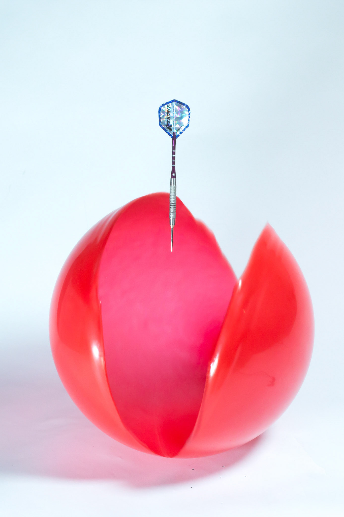 Dart dropped vertically onto a balloon