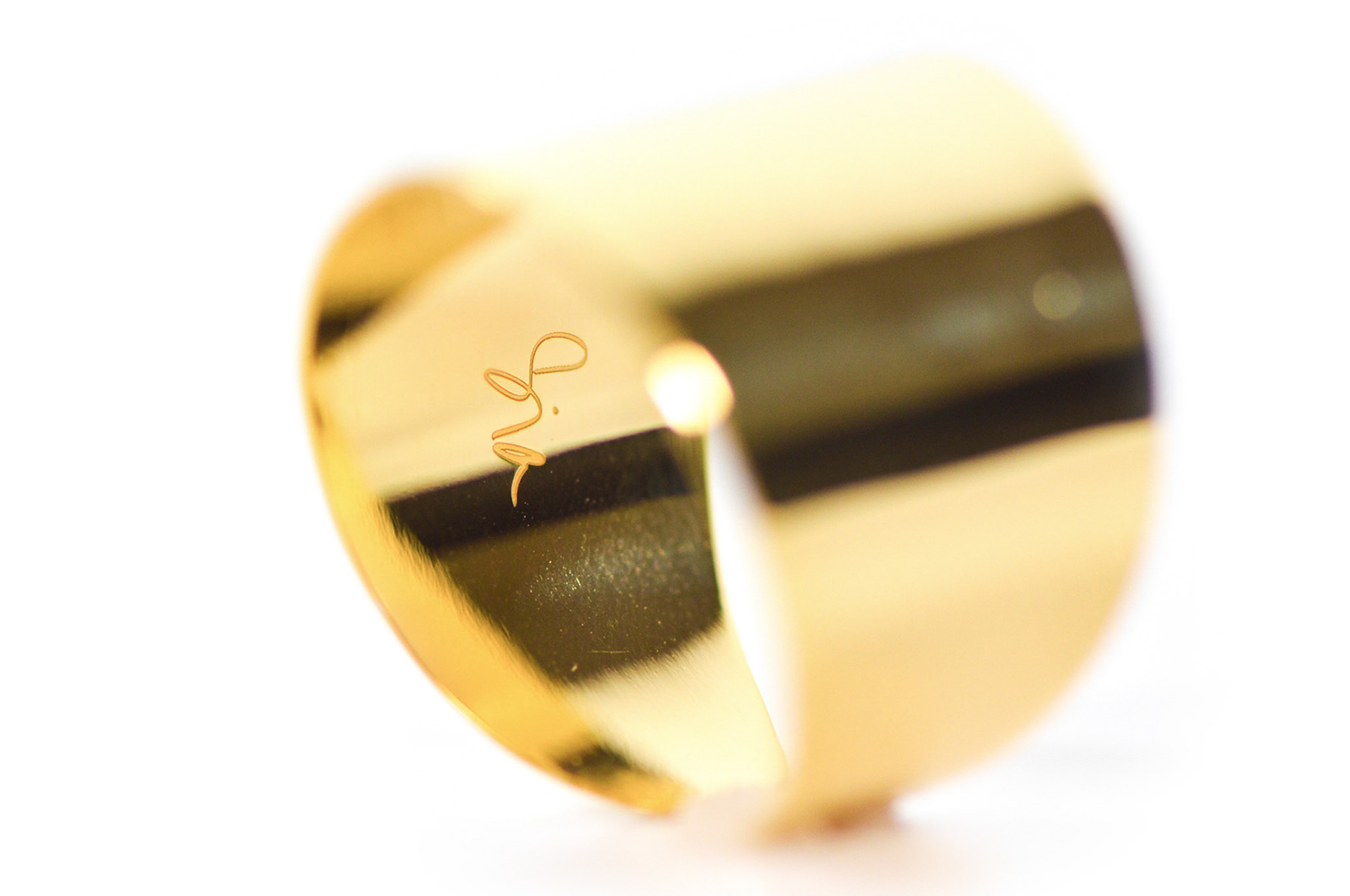 Creative photography of a gold ring for Sia Shafer - Jewellery Photographer