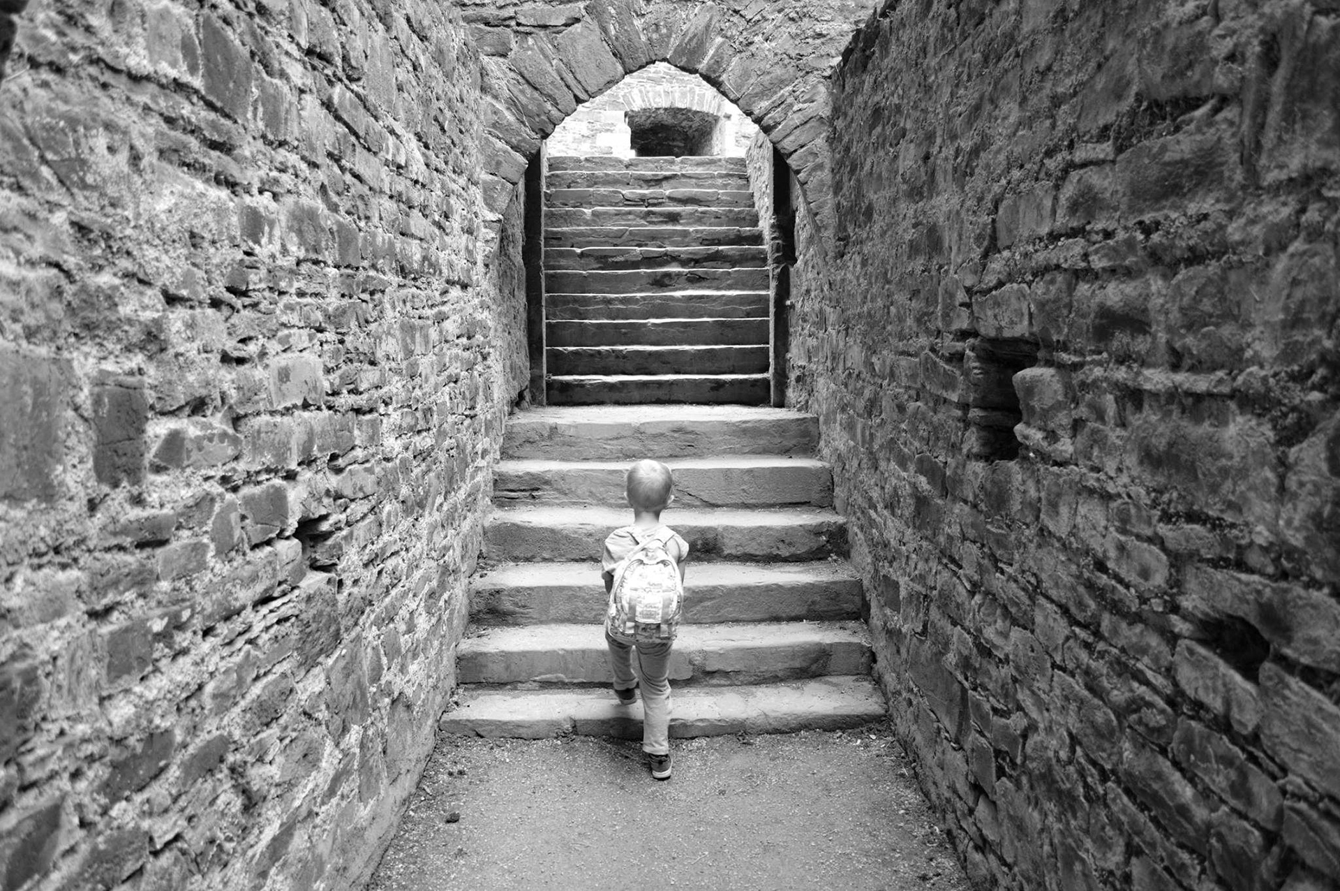 lindsey ahmet graphic designer and photographer blog image of my son walking up castle stairs location photography