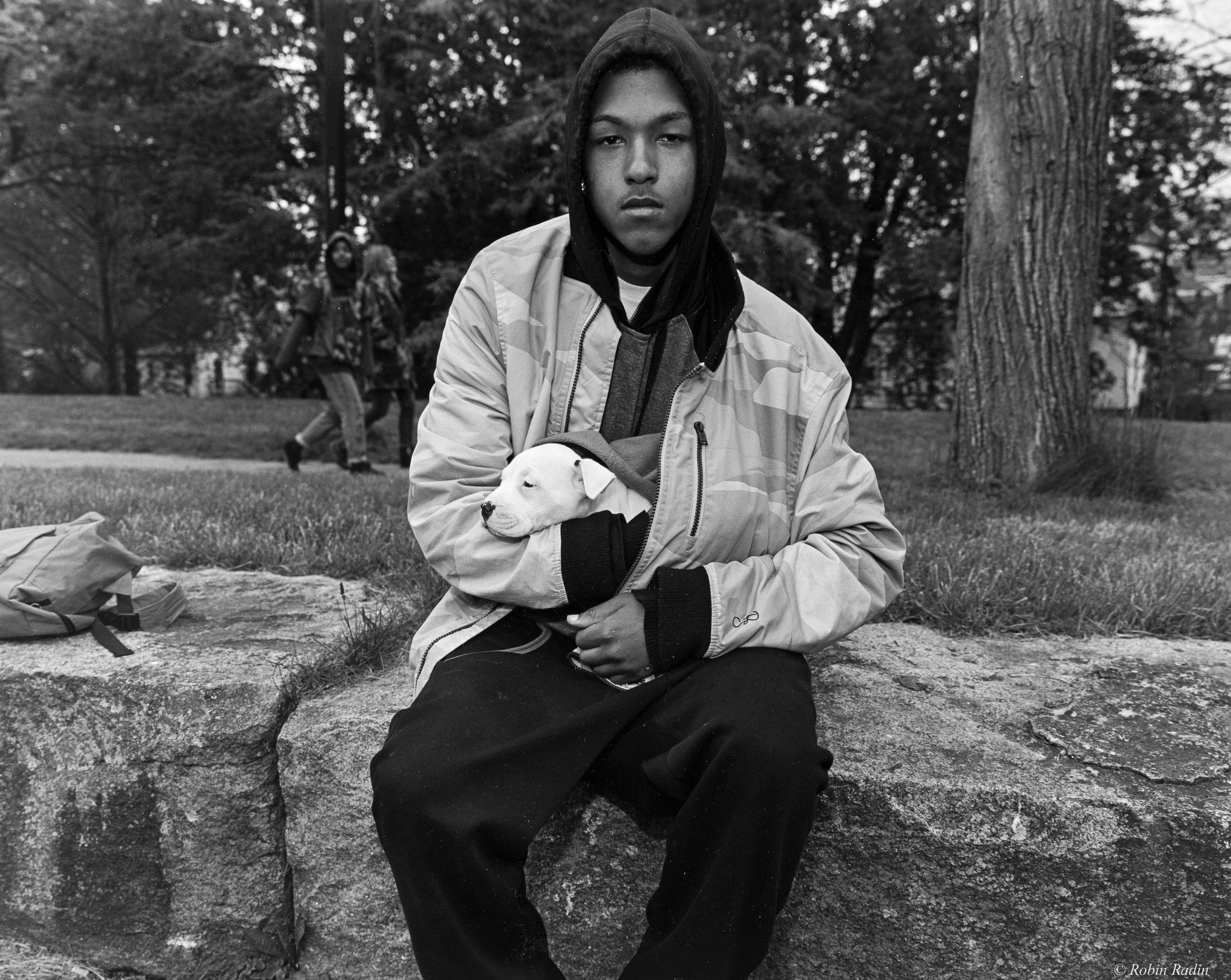 Young Man with Puppy, Southwest Corridor Park, Jamaica Plain, MA.