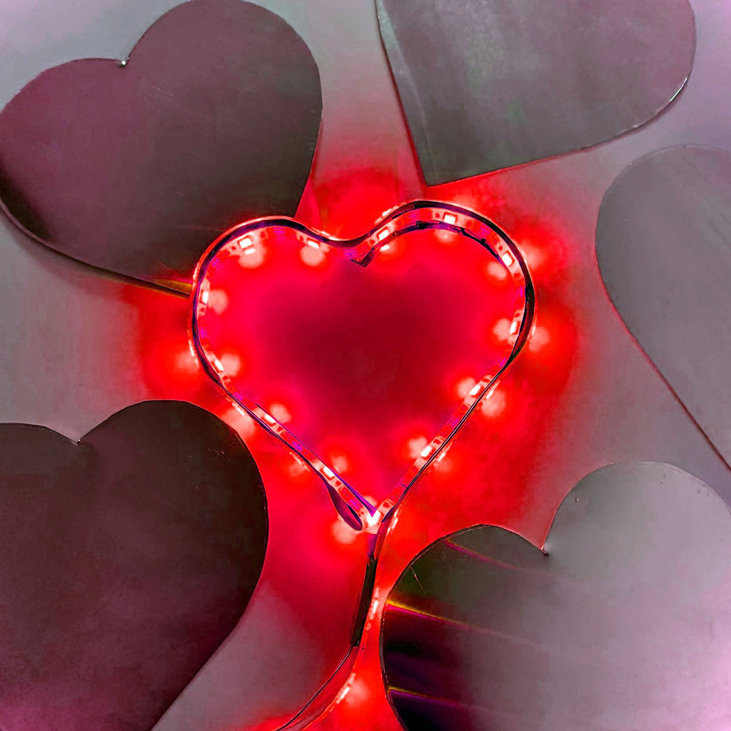 First prototype of the red LED heart breastplate designed by Markham Lane, to be worn by cast members of the 2020 Colours of Our Community float.
