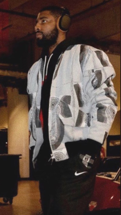 KYRIE WEARING MATCHING JACKET