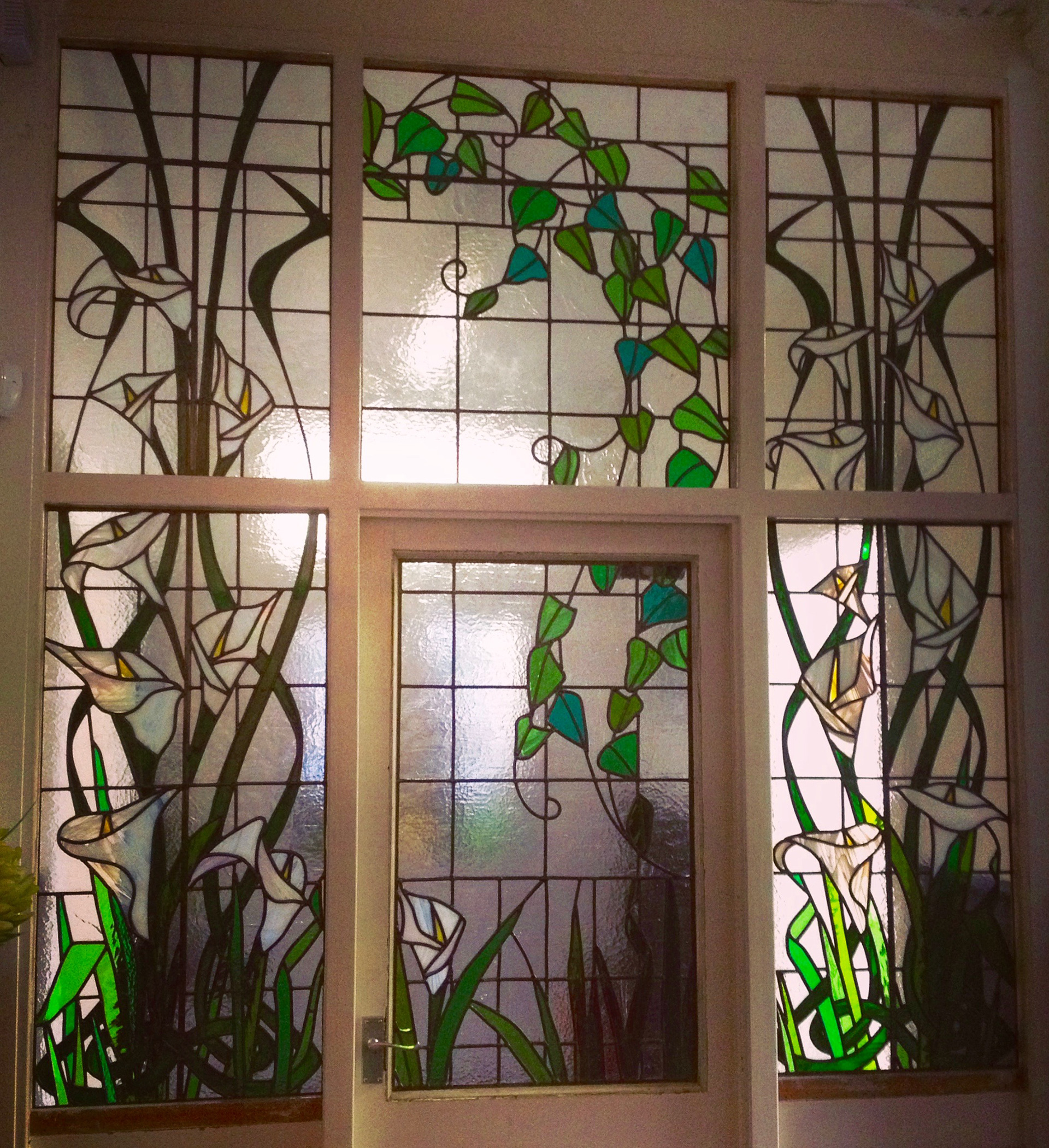 Traditional Stained Glass and art glass panels using Art Nouveau theme by Zoe Eady of The Glass Garden. Calla Lilly and ivy