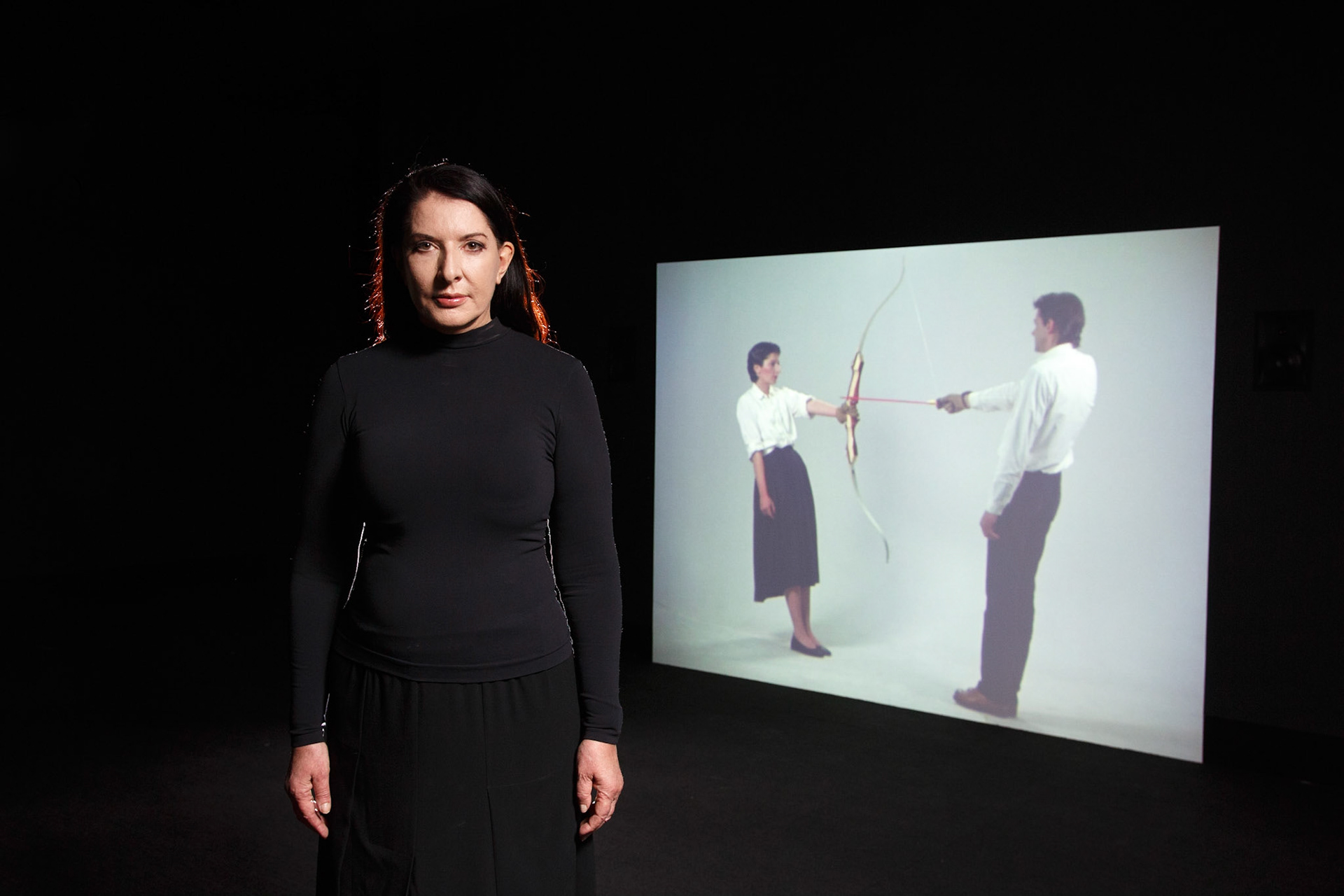 Performance artist Marina Abramović with her work "Rest Energy" (Marina Abramović &amp; Ulay) at her exhibition Private Archaeology at MONA 11.06.2015