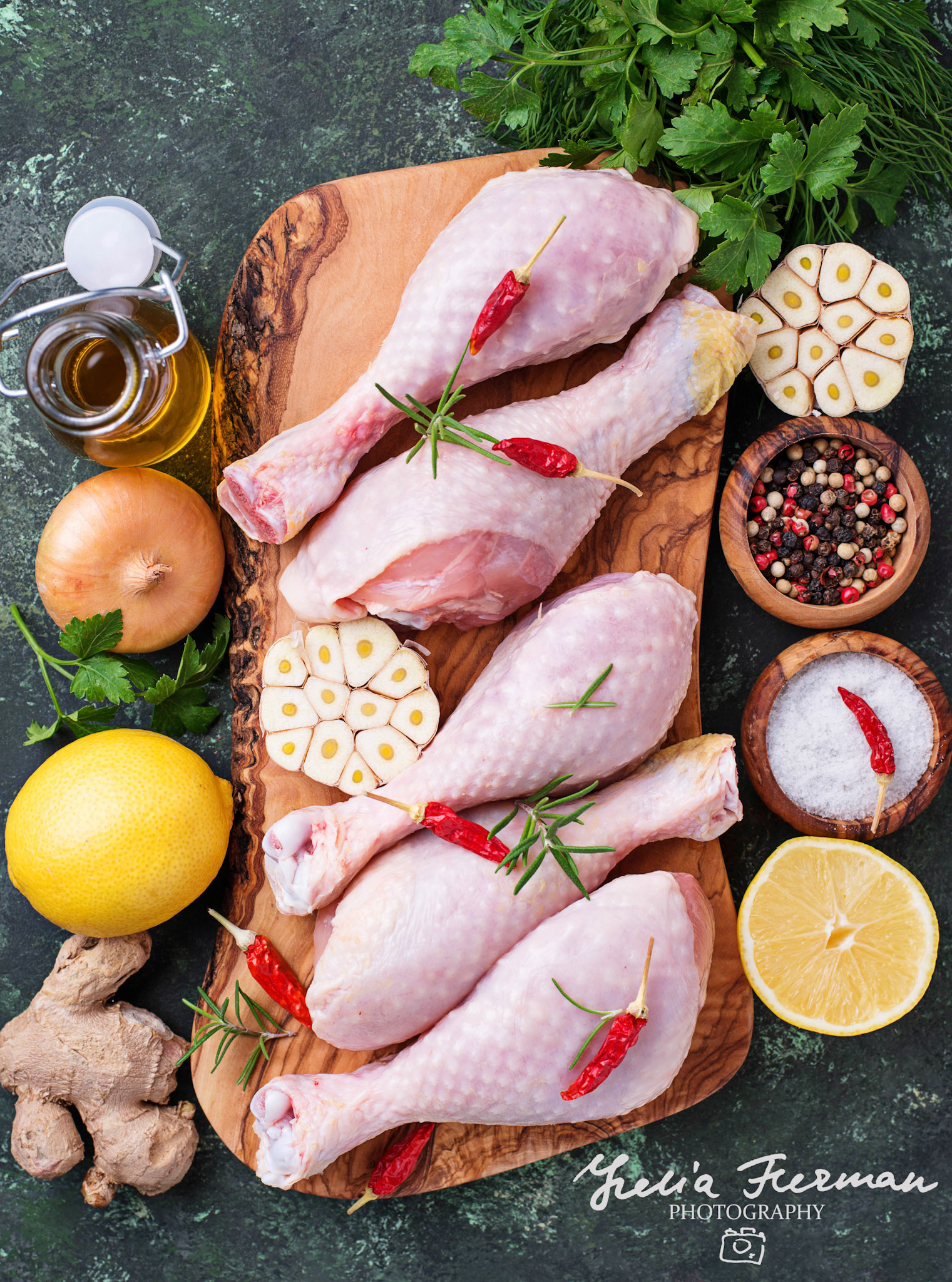 Raw chicken legs with spices and garlic. Top view