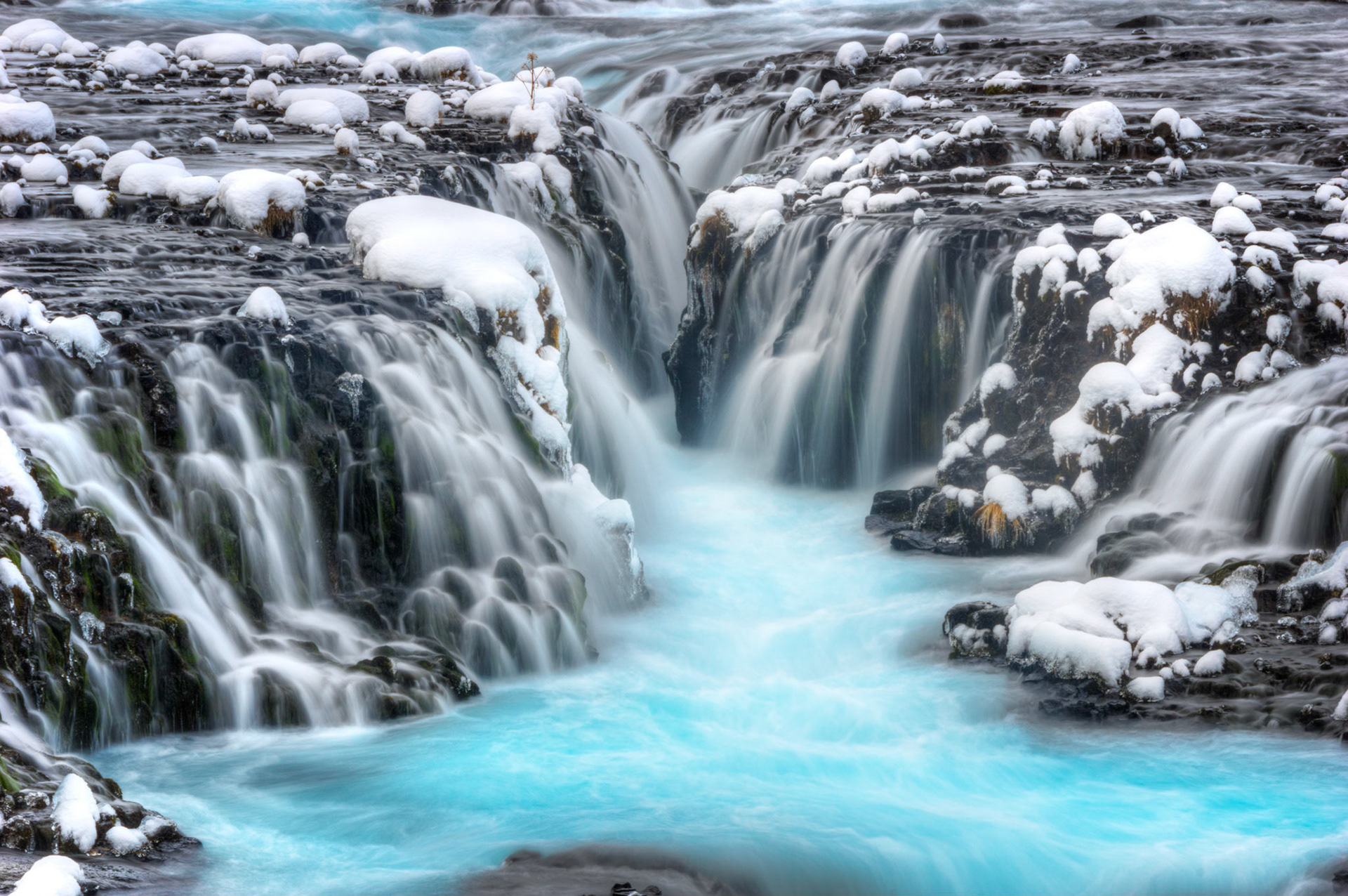 Long lens image of Brúarfoss, on the Brúará River, near Brekkuskógur, Iceland.Suðerland, IcelandJanuary 29, 2016This is an HDR image consisting of 5 exposures merged in Photomatix Pro. Additional processing in Lightroom and Photoshop.PENTAX K-3, Sigma 18-250mm f/3.5-6.3 DC OS HSMISO 100 95 mm  0.6 sec at ƒ / 18