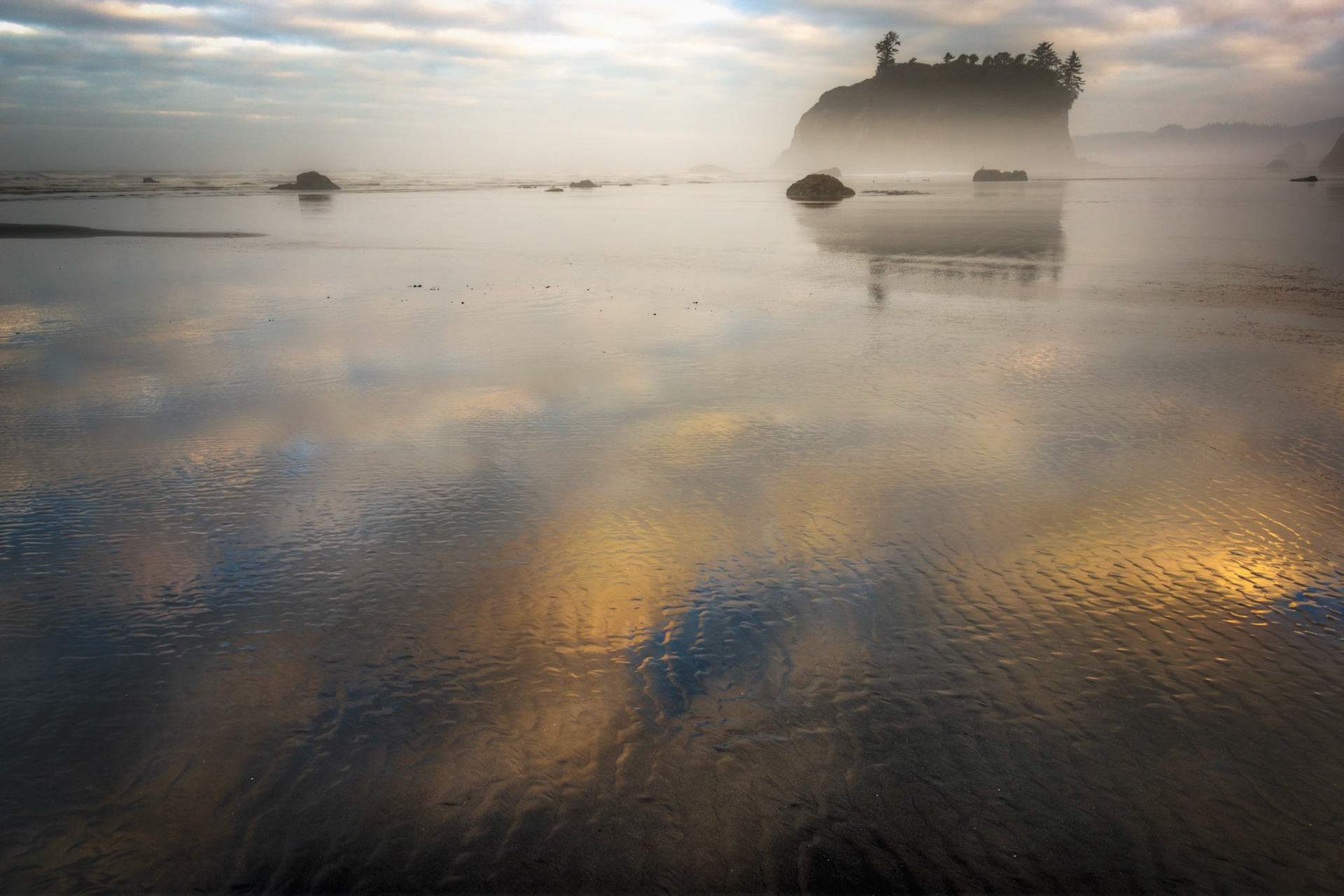 Reflections on the beach in early morning fog on Ruby Beach.Olympic National ParkWashingtonAugust 3, 2016This is an HDR image consisting of 5 exposures merged in Photomatix Pro. Additional processing in Lightroom and Photoshop.PENTAX K-1, TAMRON 28-300mm F3.5-6.3 Ultra zoom XRISO 100 28 mm  ¼ sec at ƒ / 20