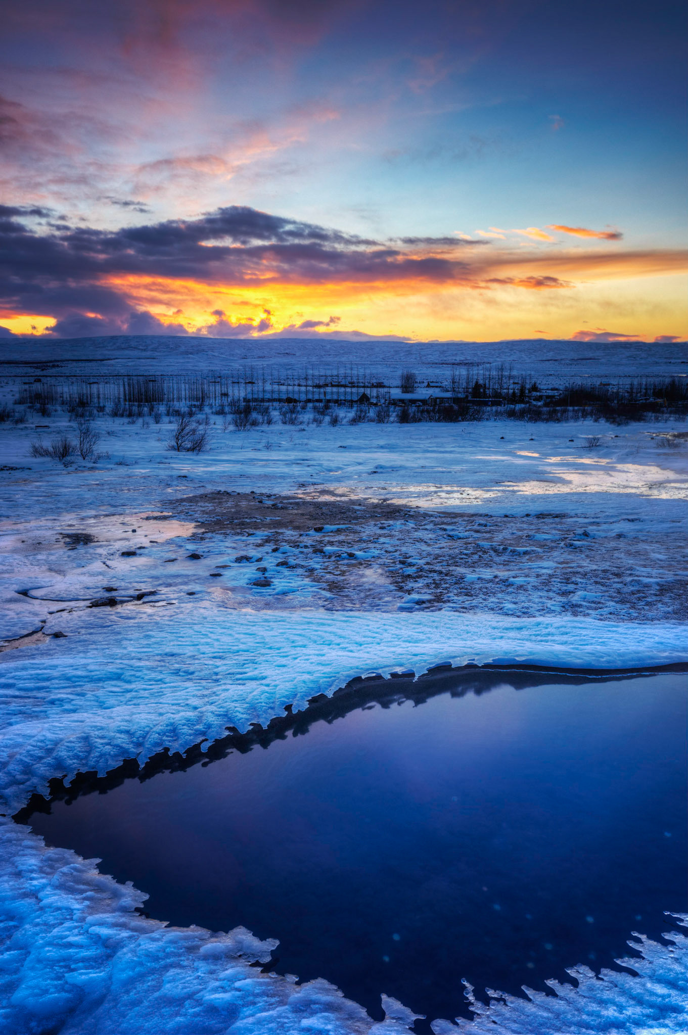 Sunrise in the Geysir geothermal region.Suðerland, IcelandJanuary 30, 2016This is an HDR image consisting of 5 exposures merged in Photomatix Pro. Additional processing in Lightroom and Photoshop.PENTAX K-3, Sigma 10-20mm f/4-5.6 EX DCISO 100 20 mm  ⅛ sec at ƒ / 11