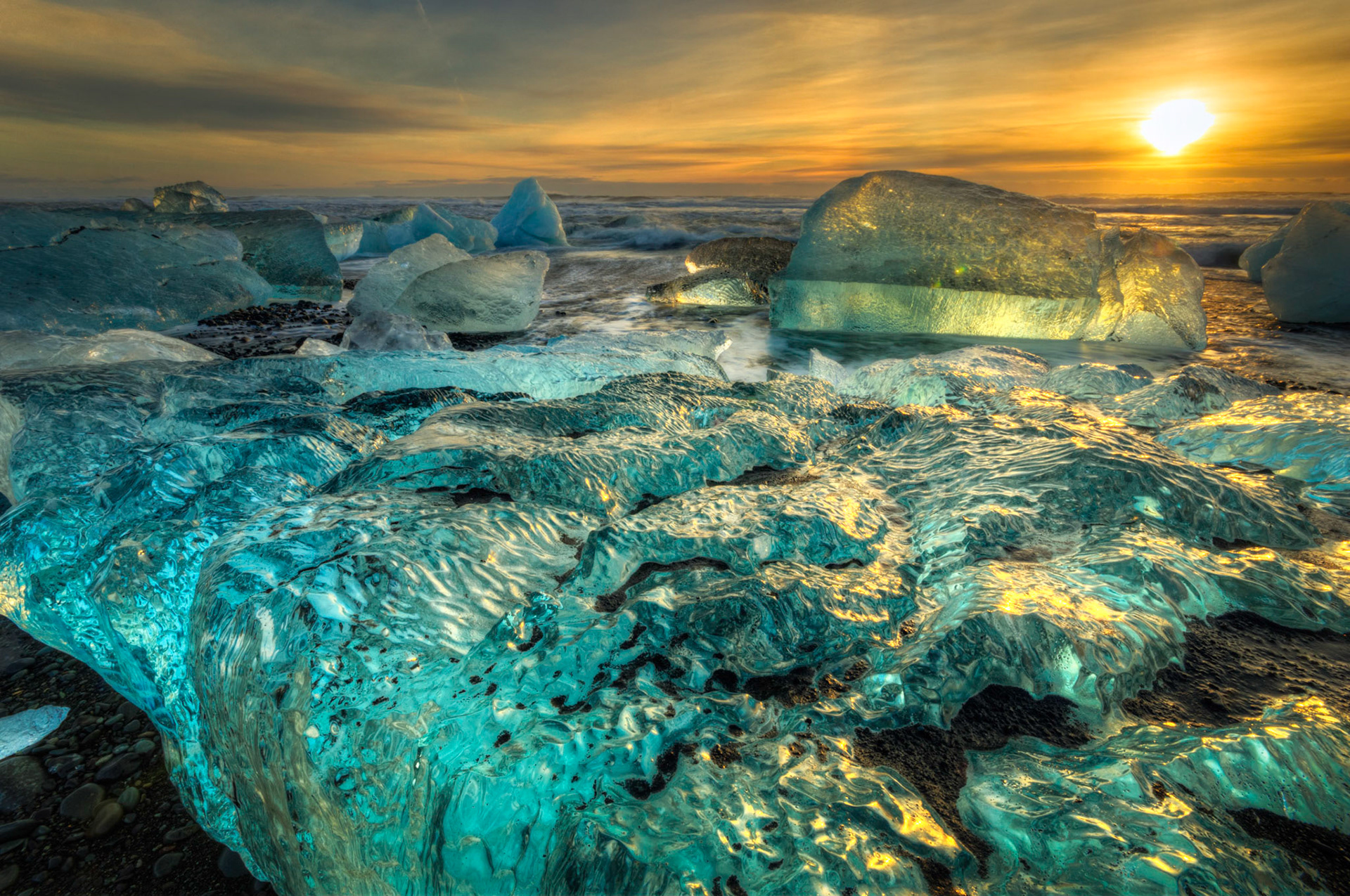 Sunrise at the ice beach at the outlet of Jökullsárlón.Austurland, IcelandFebruary 2, 2016This is an HDR image consisting of 5 exposures merged in Photomatix Pro. Additional processing in Lightroom and Photoshop.PENTAX K-3, Sigma 10-20mm f/4-5.6 EX DCISO 100 10 mm  ¹⁄₁₀ sec at ƒ / 18