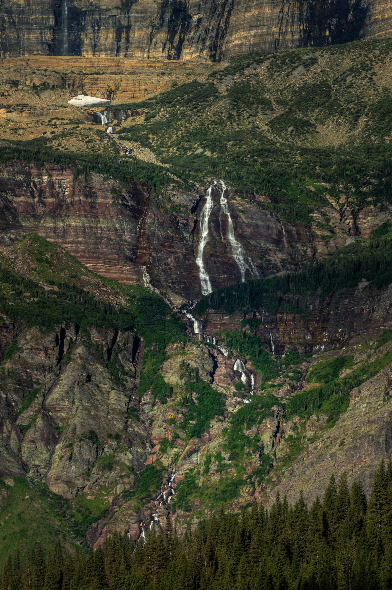 Grinnell Creek, flowing out of Grinnell Lake on it's way to Lake Josephine, by way of Grinnell Falls.Glacier National ParkJuly 29, 2015This is an HDR image consisting of 5 exposures merged in Photomatix Pro. Additional processing in Lightroom and Photoshop.PENTAX K-3, Sigma 50-500mm f/4.5-6.3 APO DG OS HSM SLDISO 100 240 mm  ¹⁄₂₅₀ sec at ƒ / 8.0