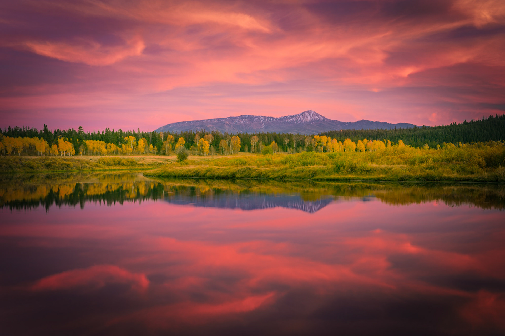 Reflections of clouds in the Snake River, at Oxbow Bend.Grand Teton National ParkWyomingSeptember 26, 2016PENTAX K-1, TAMRON 28-300mm F3.5-6.3 Ultra zoom XRISO 100 63 mm  4.0 sec at ƒ / 18