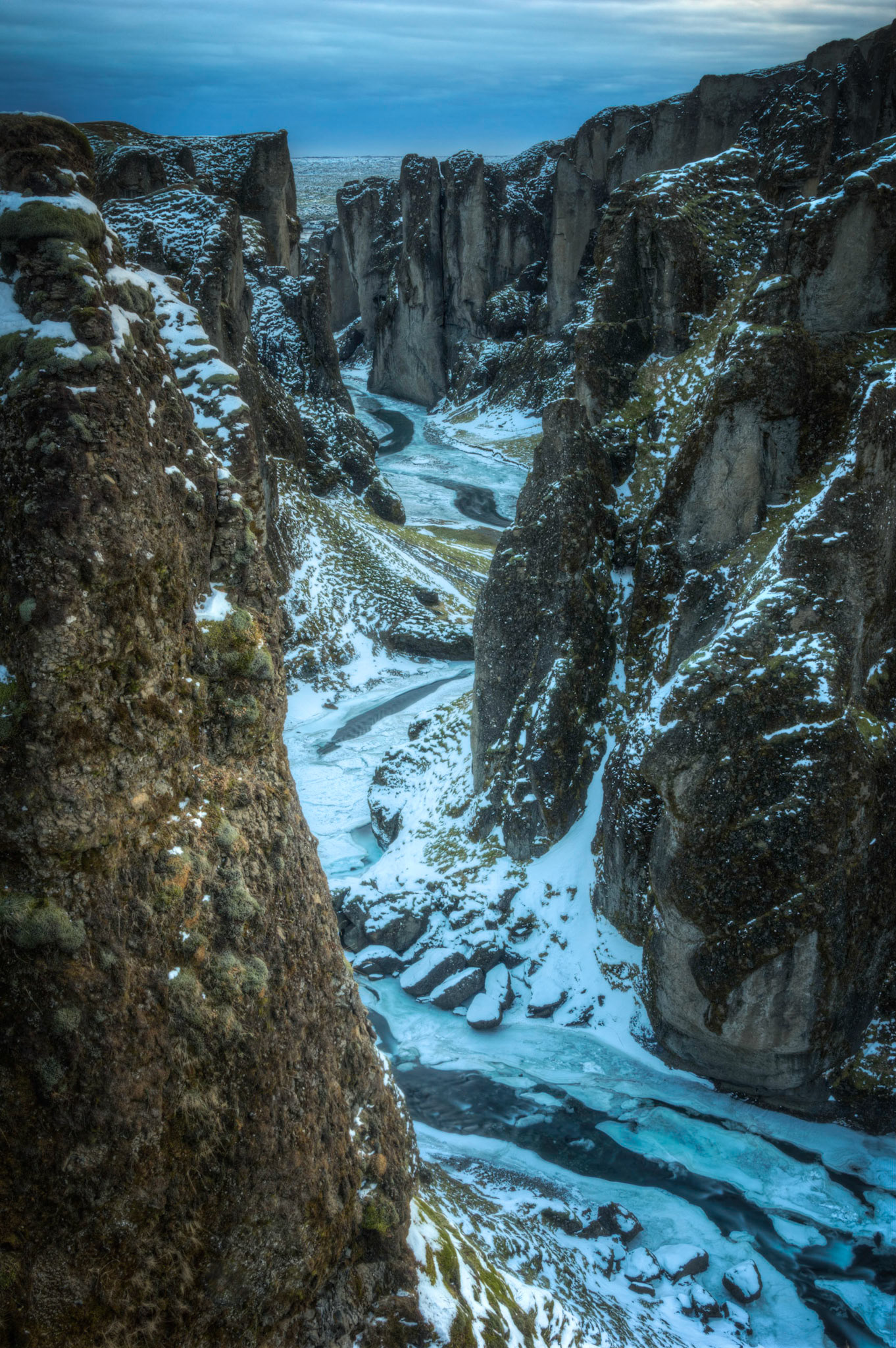 The Fjaðrágjlúfur canyon, near Kirkjubærklaustur.Suðerland, IcelandFebruary 2, 2016This is an HDR image consisting of 5 exposures merged in Photomatix Pro. Additional processing in Lightroom and Photoshop.PENTAX K-3, Sigma 18-250mm f/3.5-6.3 DC OS HSMISO 100 28 mm  4.0 sec at ƒ / 16