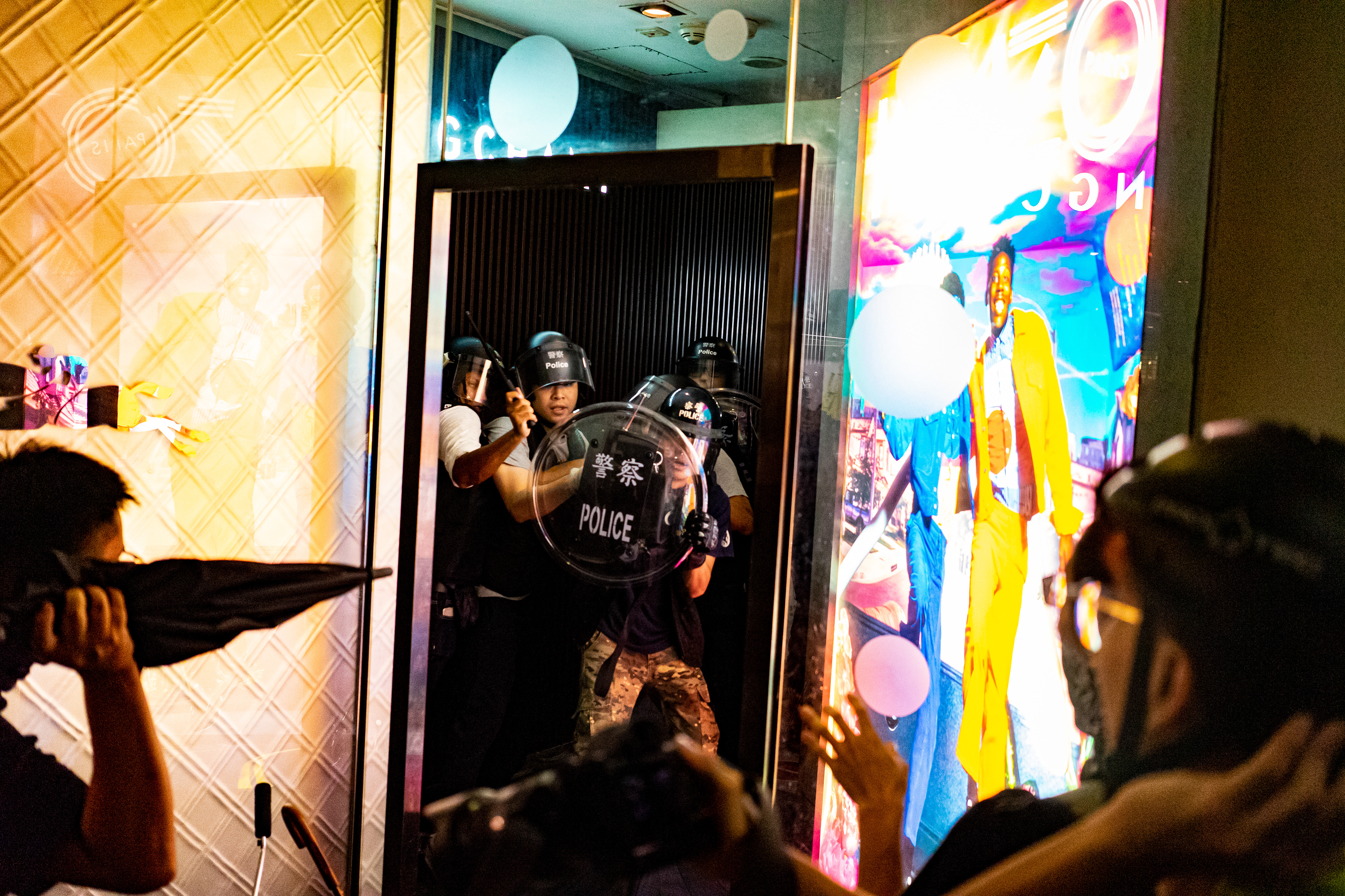 Protestors eventually drive the small cadre of officers whom first entered the mall, back down the stairwell they entered from. A protest in the Sha Tin suburb of Hong Kong was largely peaceful, until police pursued protestors into the New Park Mall. July 14, 2019
