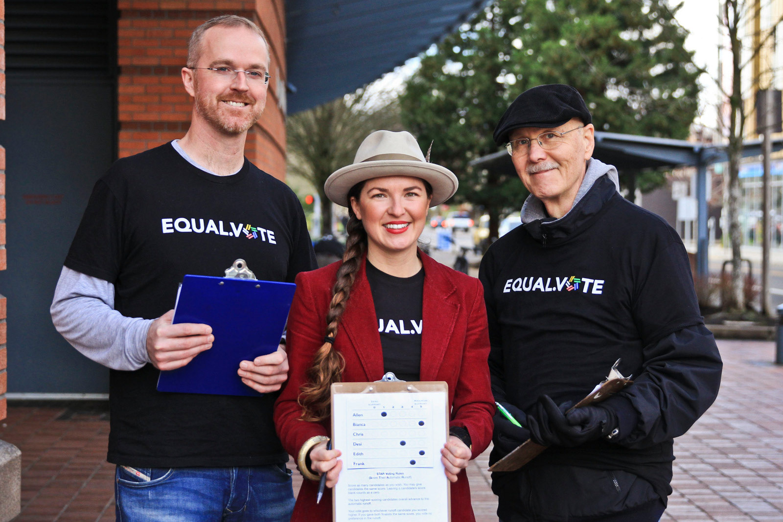 STAR Voting committee gathering signatures on the street, with Mark Frohnmeyer and Hallie Roberts