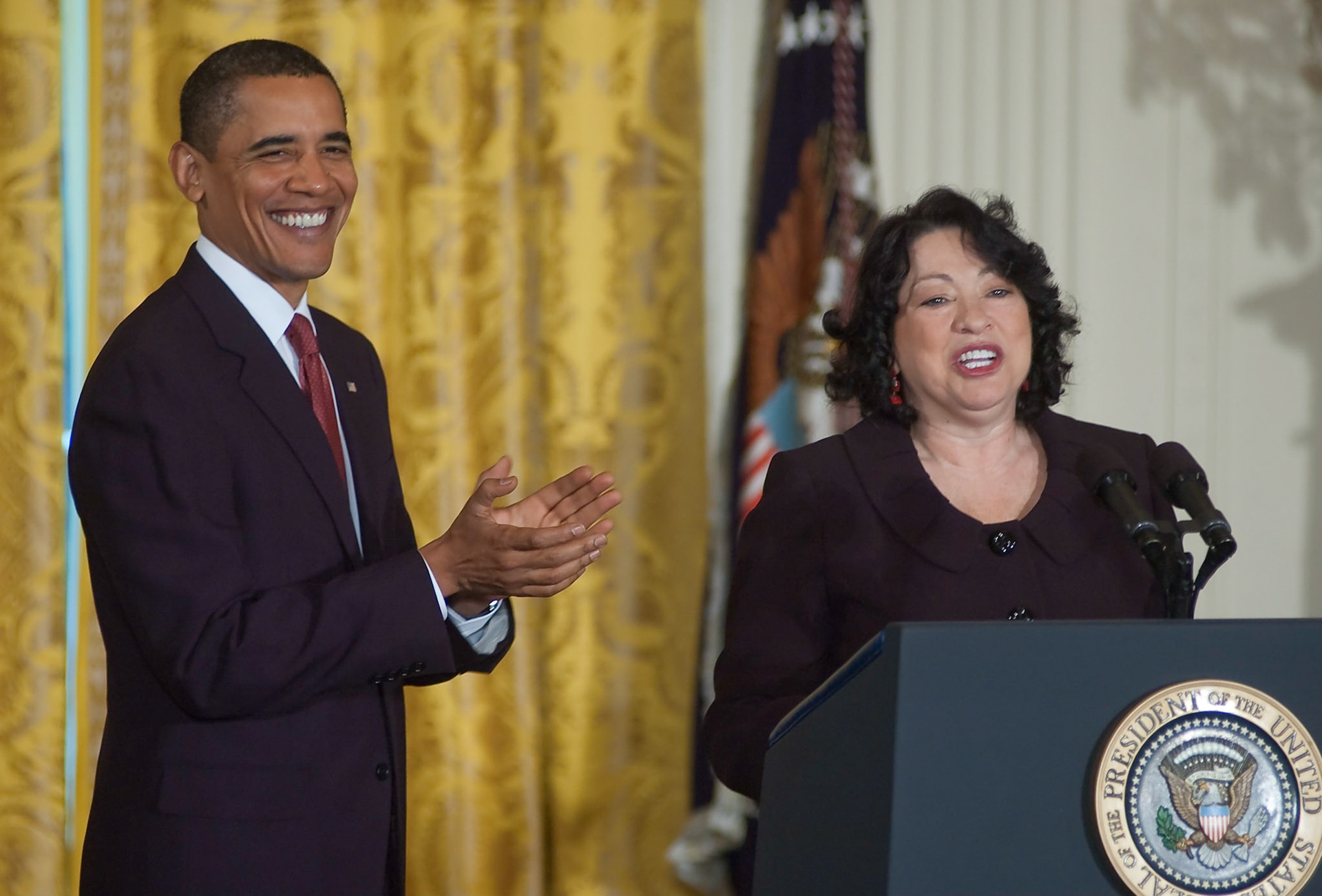 President Barack Obama applaudes the remarks of Justice Sotomayor during a White House East Room reception, August 12, 2009.