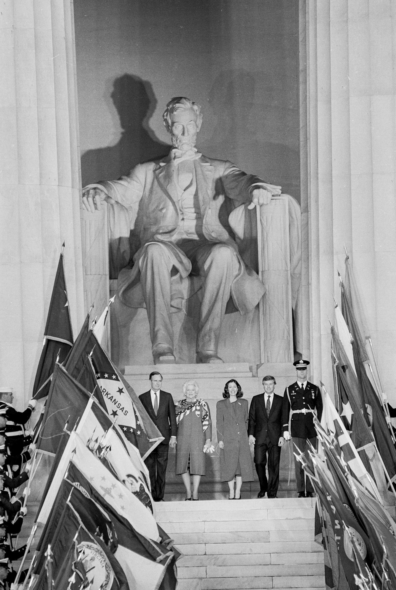 President-elect and Barbara Bush with VP-elect Dan and Marilyn Quayle walk out of the Lincoln Memorial to kick off pre-Inaugural ceremonies January 18, 1989.