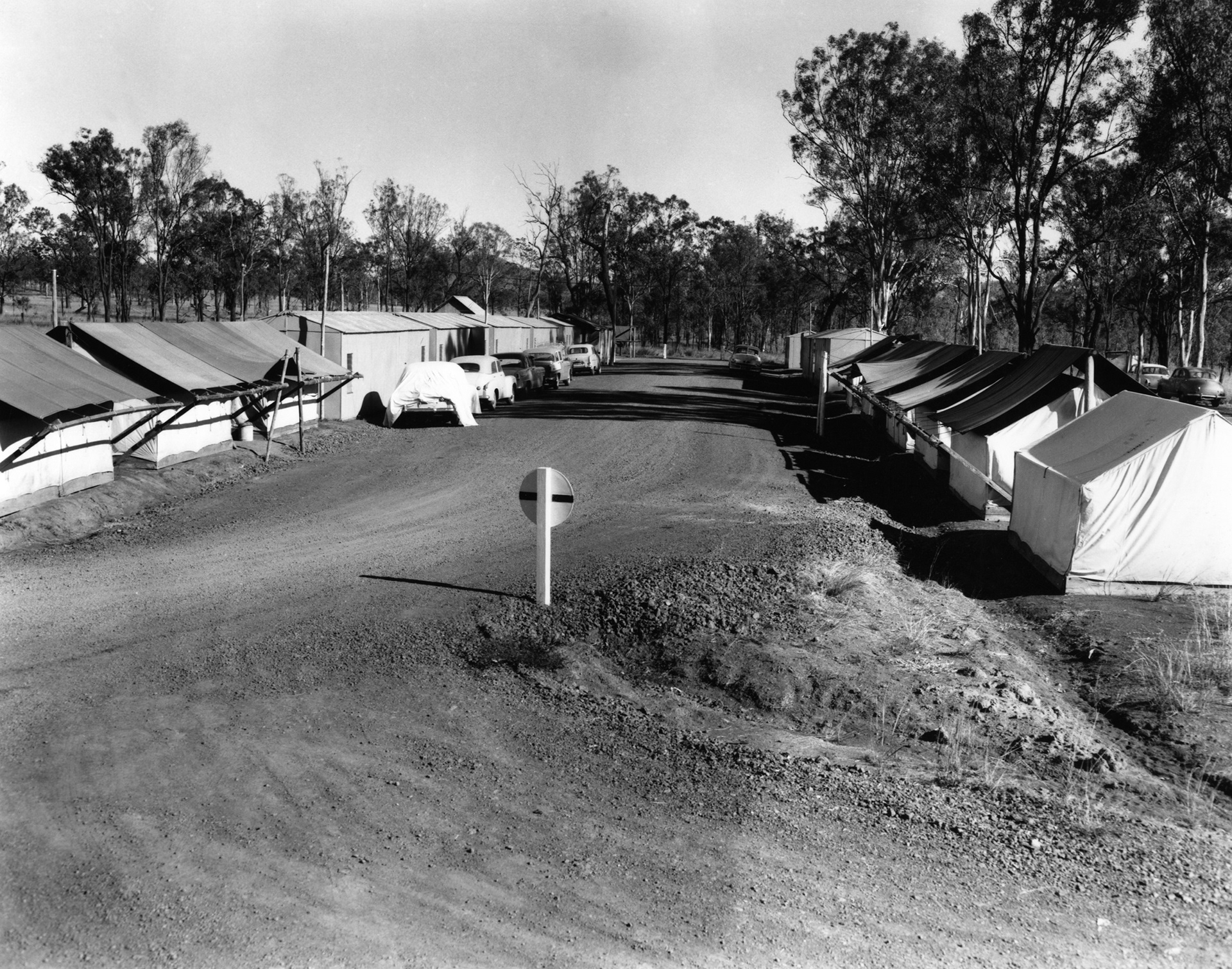 Two cars driving over the Burdekin River Bridge.