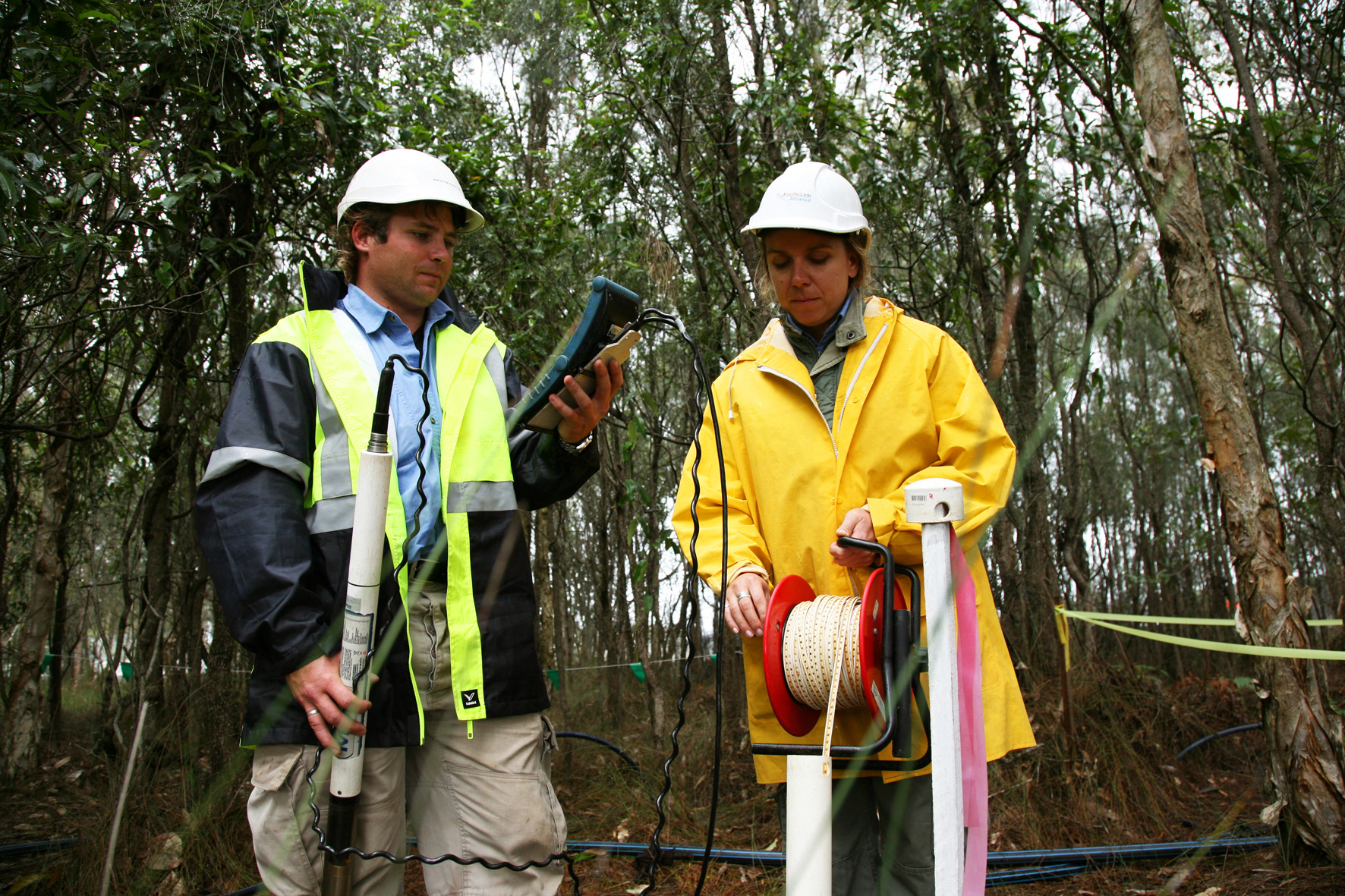 Environmental Officers conducting tests at sediment ponds