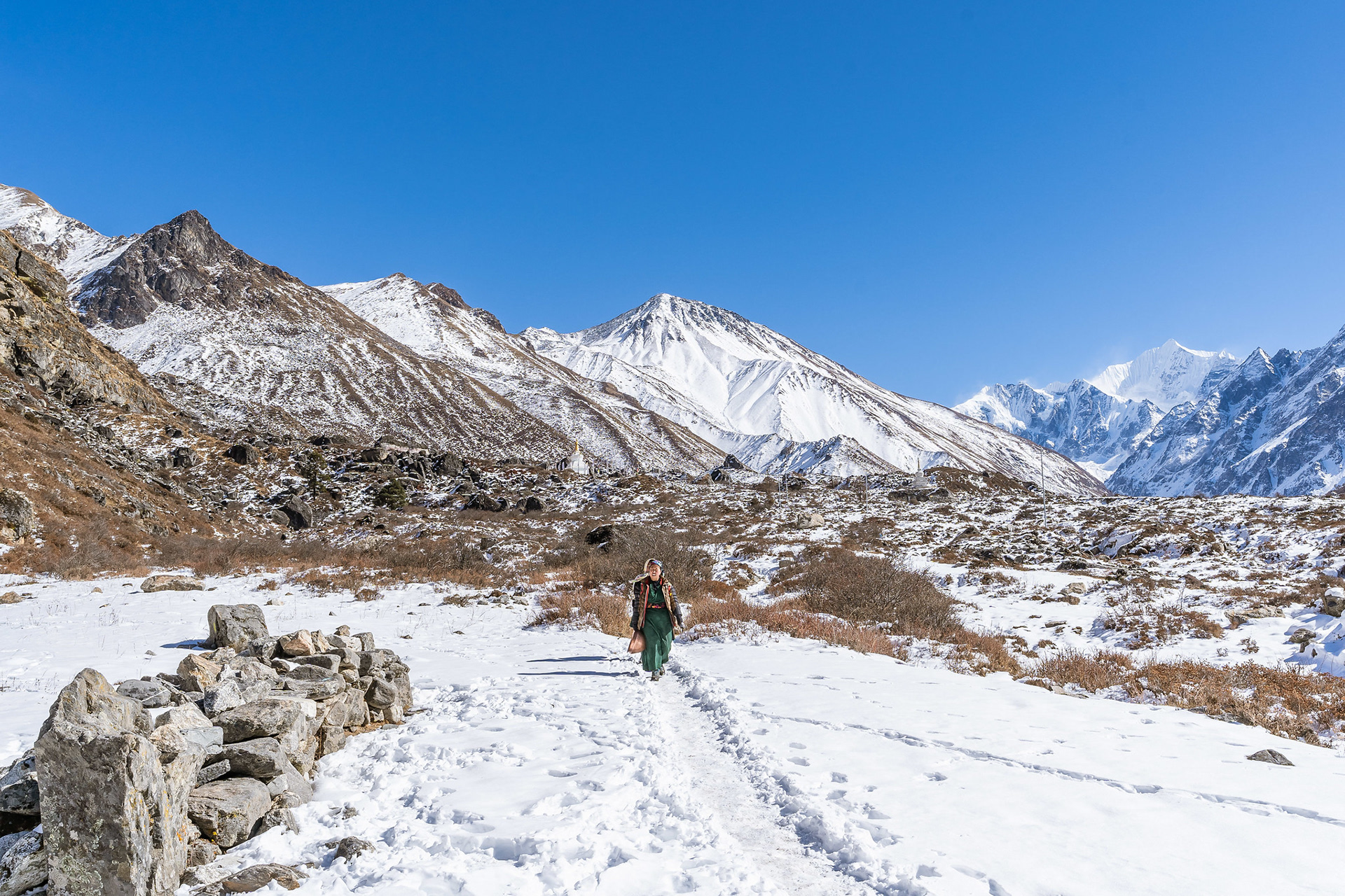 Villager travelling through the high passes for supplies.