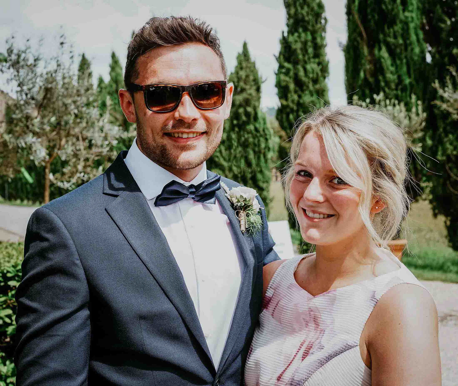 couple with sunglasses at san galgano wedding