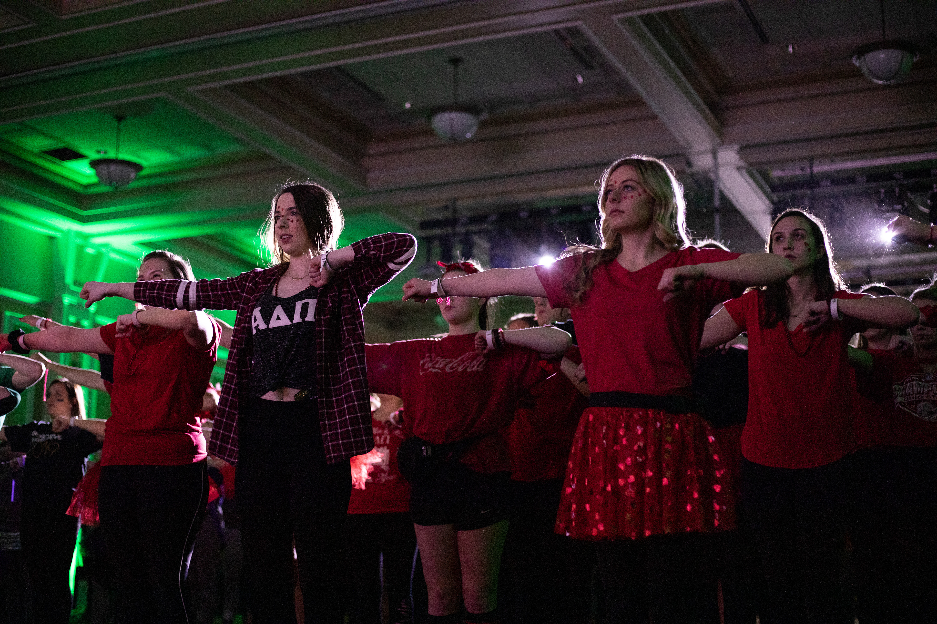 Elise Semko, left, and Shane Bradshaw learn dance moves at Ohio University’s Bobcathon in the Baker Ballroom at Ohio University on Feb. 16, 2019. Bobcathon is a 12-hour dance marathon that raises money for charity; this year, they sponsored the Ronald McDonald of Central Ohio.