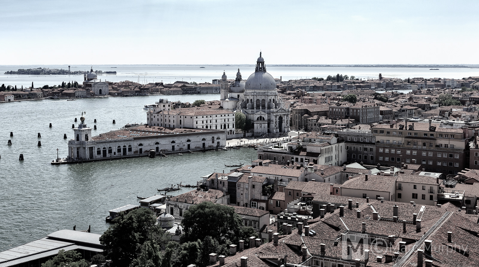 De-Saturated Grand Canal in Venice Italy from Elevated Position with Basilica di Santa Maria della Salute, Gondolas and Rooftops