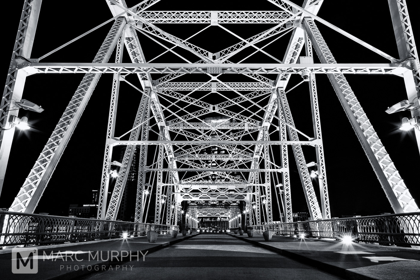 Black and White Downtown Nashville Tennessee John Seigenthaler Bridge with Sunburst Lights and a White Steel Structure
