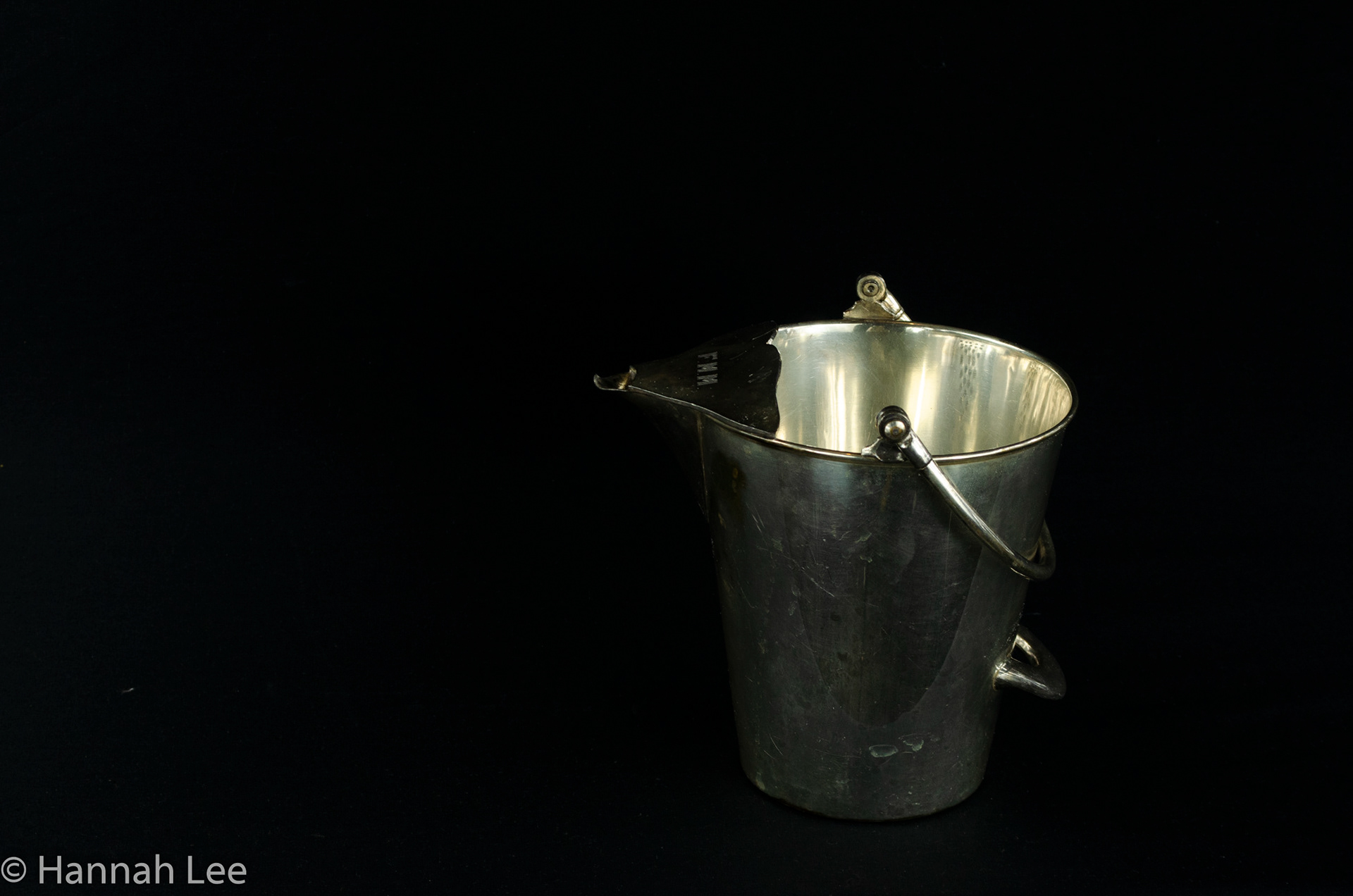 Water Pail. Somerville, MA. Taken by Hannah Lee on November 12, 2020. 48mm iso 400 f8 1/80s