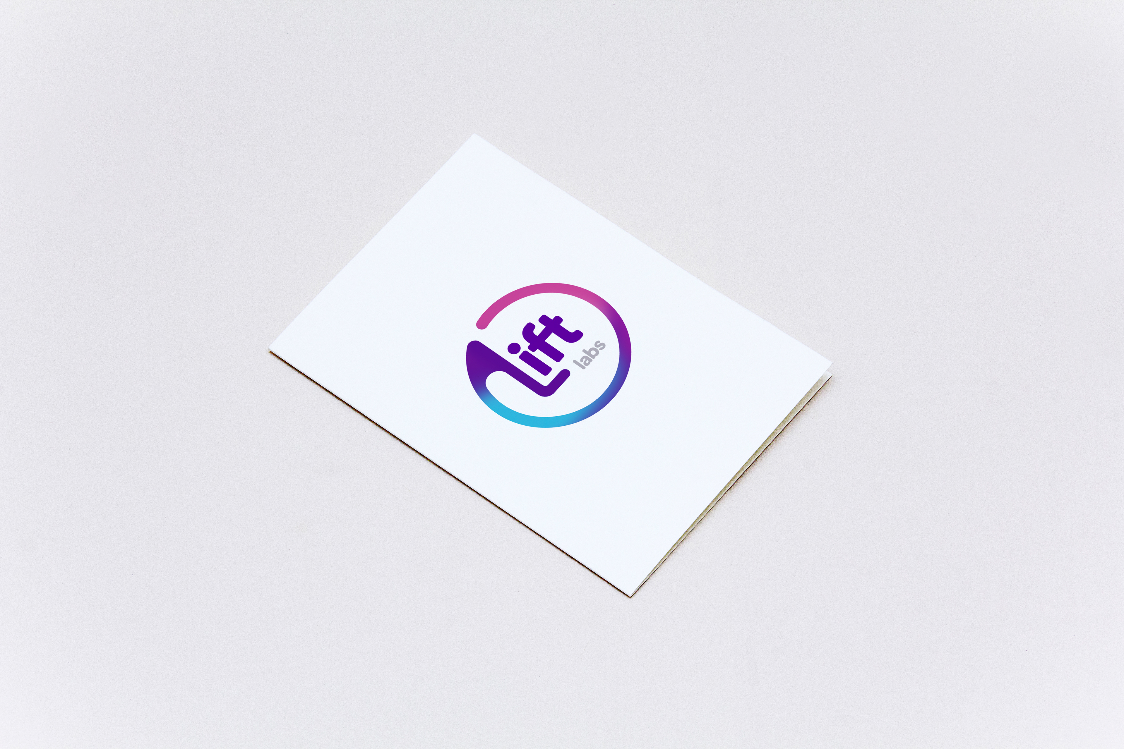 Lift labs branding and logo applied to a postcard size object.
