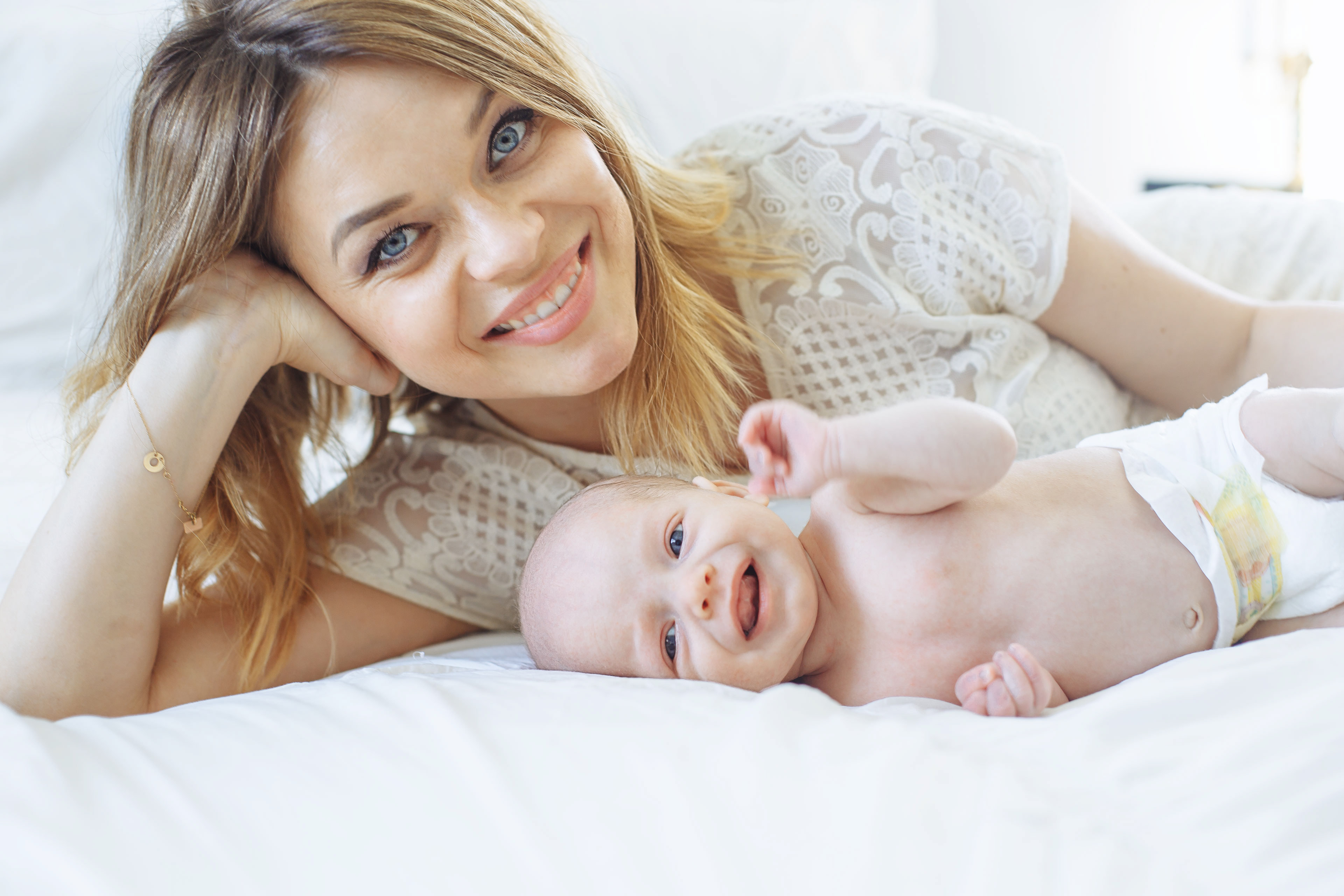 newborn baby smiling